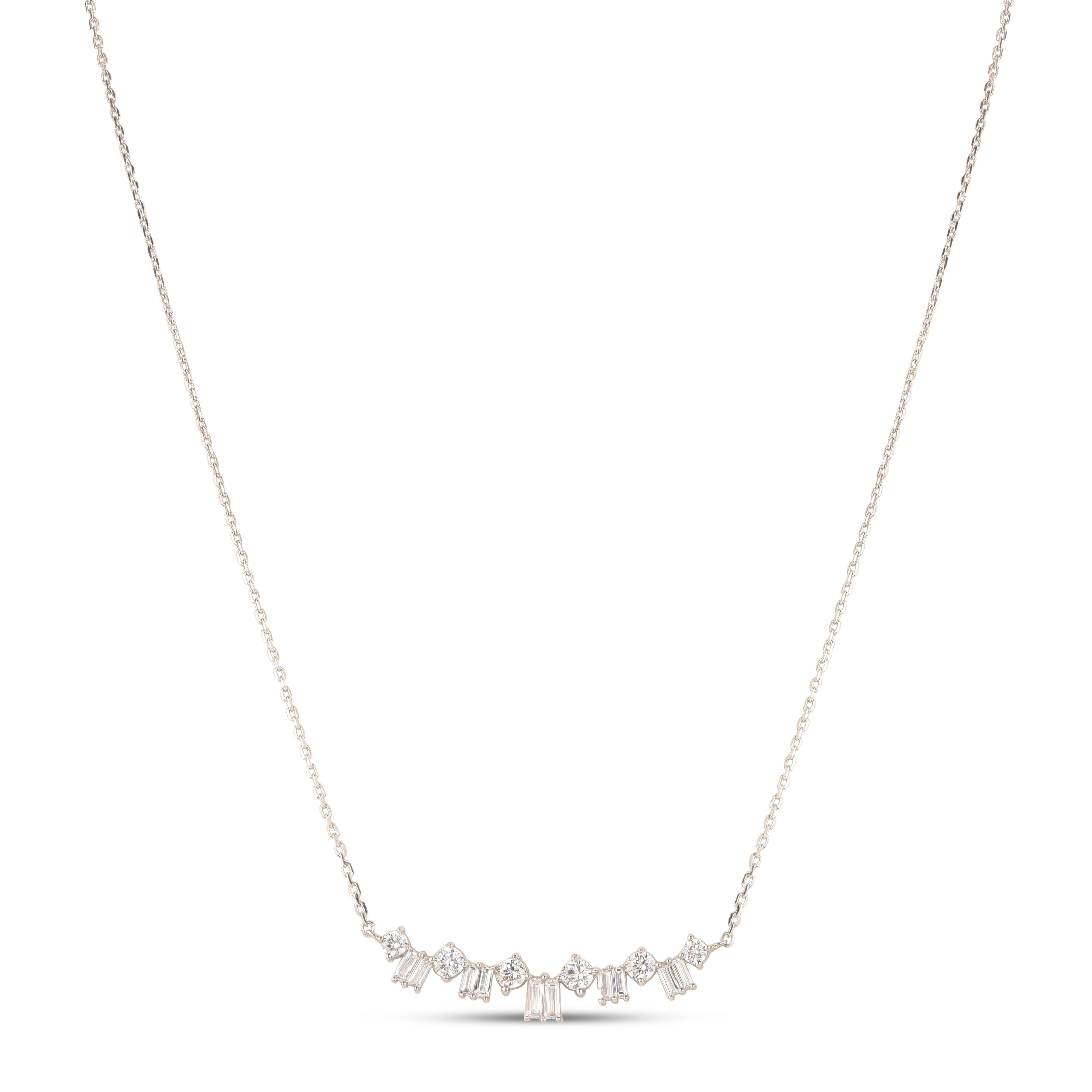 This pendant necklace is studded elegantly with 6 brilliant and 10 baguette cut diamonds set in prong setting and handcrafted in 18-Karat White Gold. The diamonds are graded H-I Color, I2 Clarity. This cable chain necklace is a great match for your