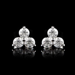 TJD 0.75 Carat 3 Stone Round Diamond 14 Karat White Gold Earrings