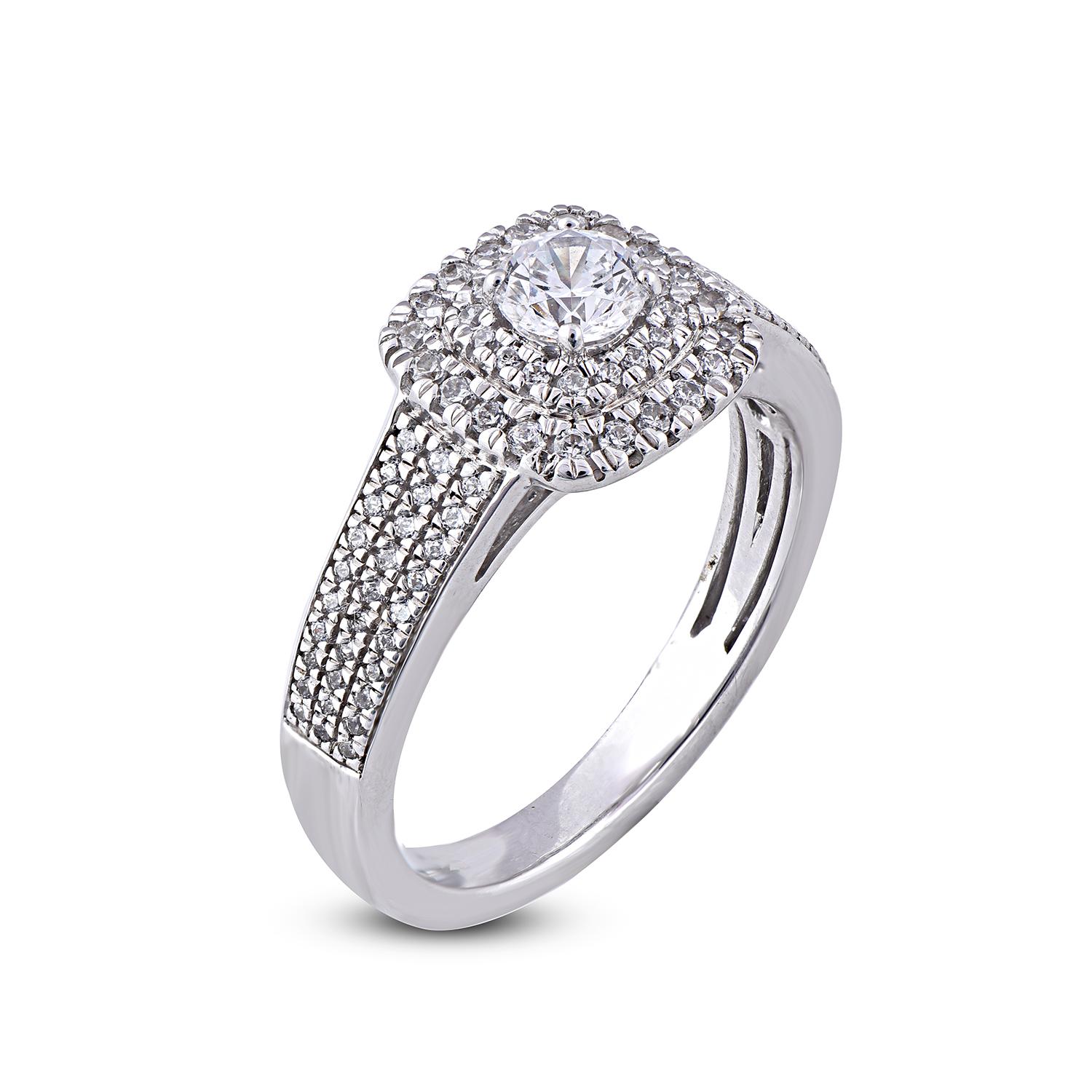 Gorgeous ring that will shine for a lifetime. The ring dazzles with 97 diamonds in prong and pave setting. Crafted in 14 Karat white gold, diamonds are graded H-I Color, I2 Clarity.