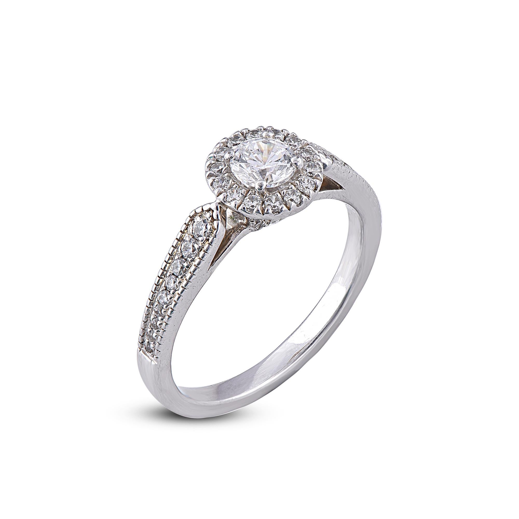 A classic look that compliments any attire, these halo Engagement diamond ring are a stunning addition to your jewelry box. Studded with 0.40ct of center stone and 0.35ct and diamonds line on frame and shank total 45 round diamonds set in Pave &