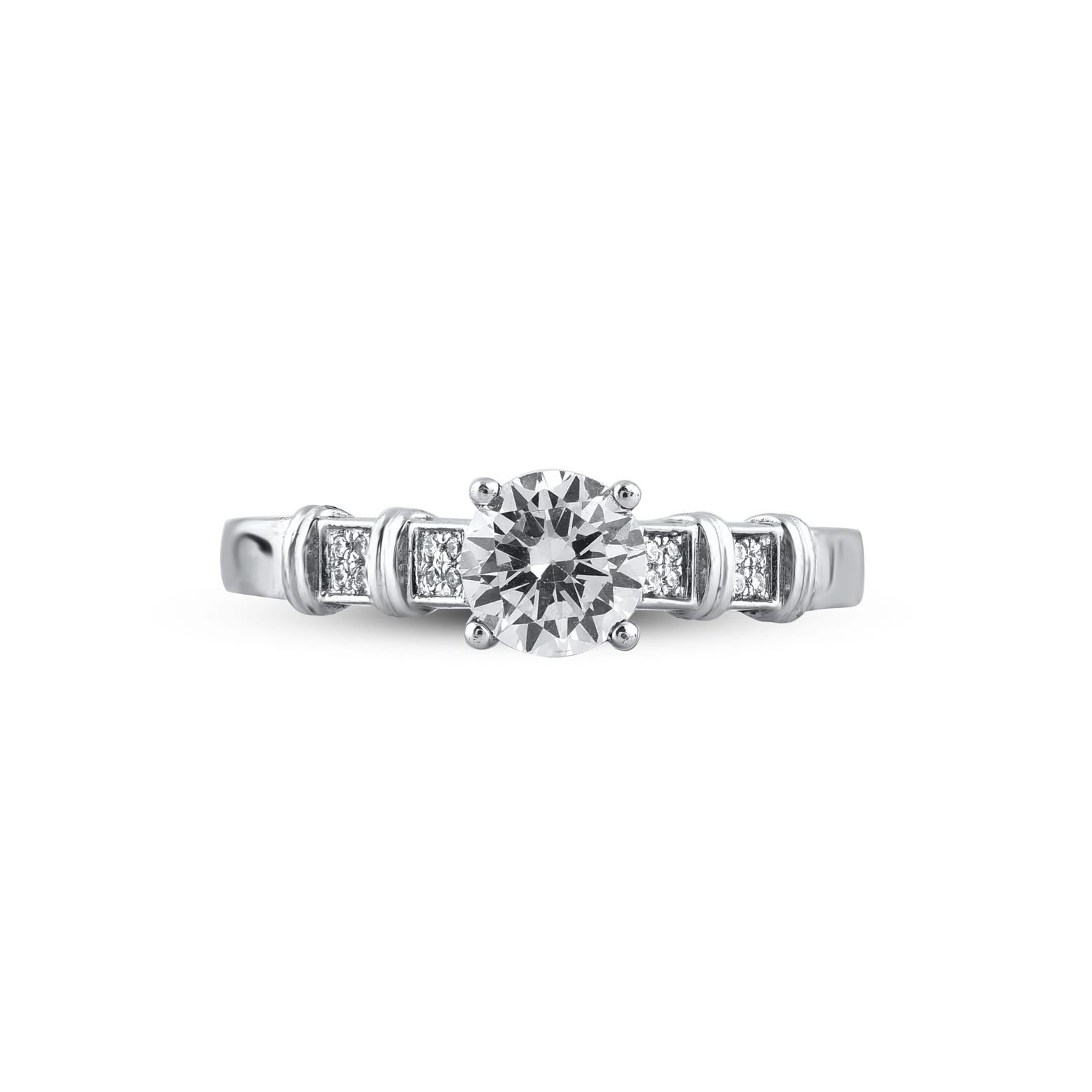 A sweet symbol of your everlasting romance, expertly crafted in 14 Karat white gold and shines with 17 single cut and brilliant cut diamond in prong and pave setting. The total weight of diamonds 0.75 carat, H-I color and I2 Clarity. This ring has