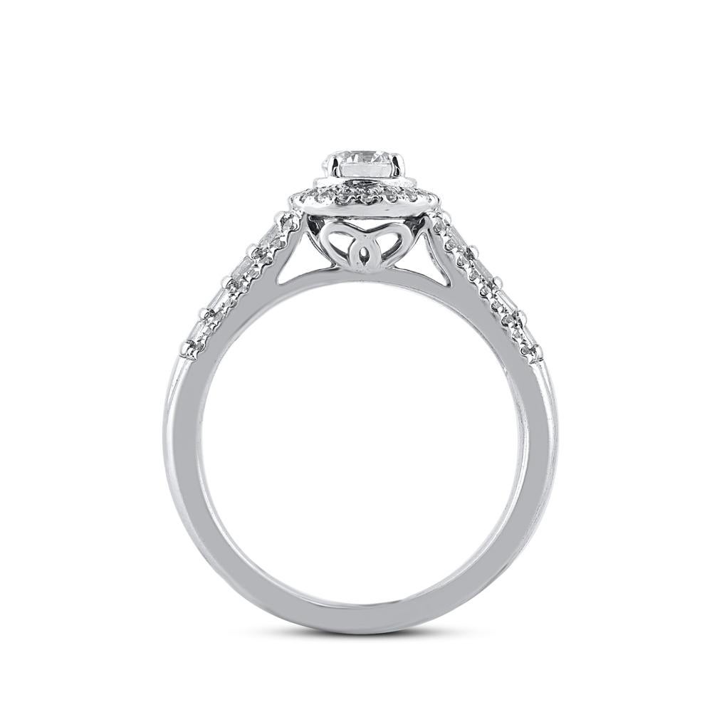 TJD 0.75 Carat Round and Baguette Diamond 14KT White Gold Halo Engagement Ring In New Condition For Sale In New York, NY