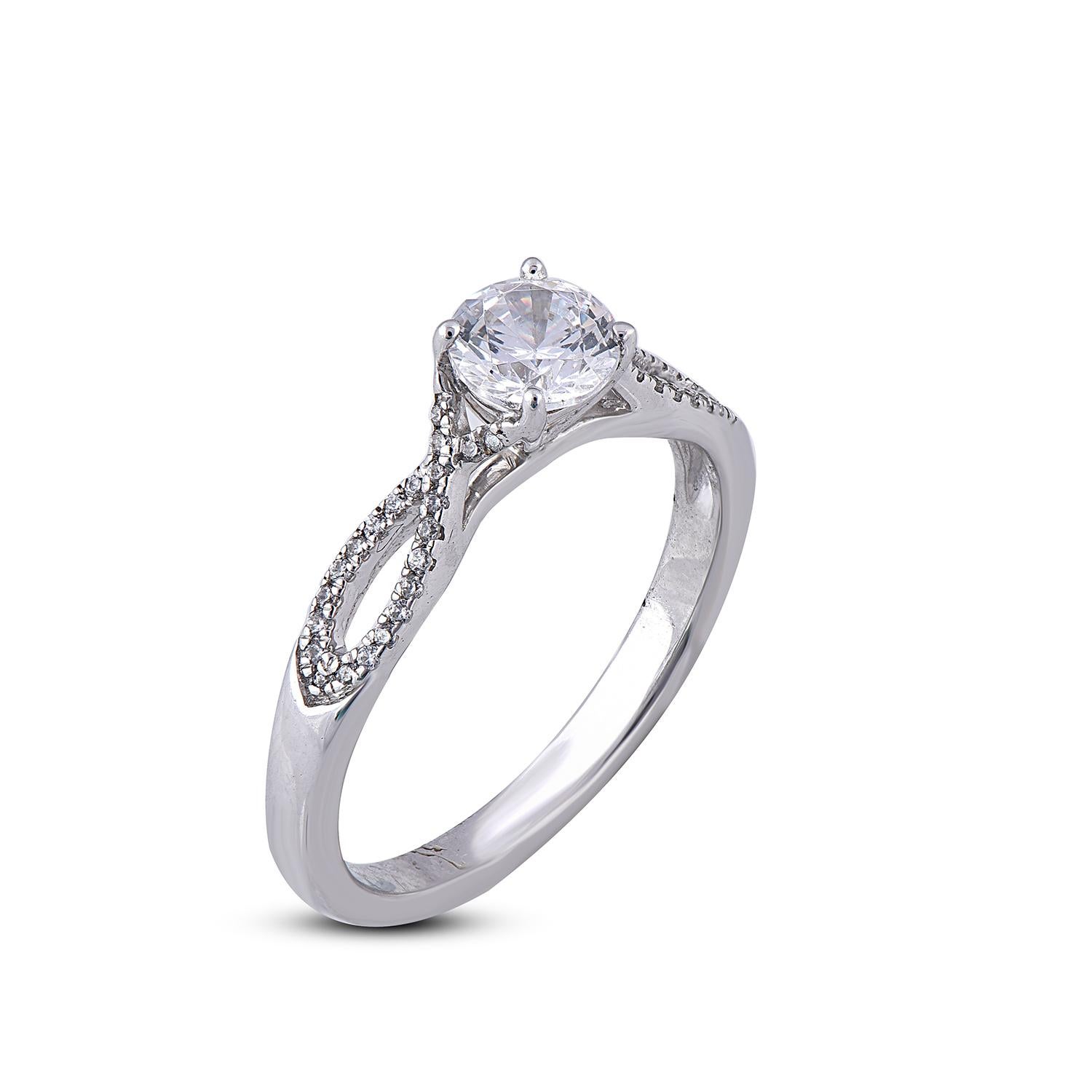 A sweet symbol of your everlasting romance, expertly crafted in 18 Karat white gold and shines with 0.65ct center stone and 0.10ct adorning the shank made in Prong and pave setting and glittering in 45 round diamond with G-H color SI1-2 clarity,