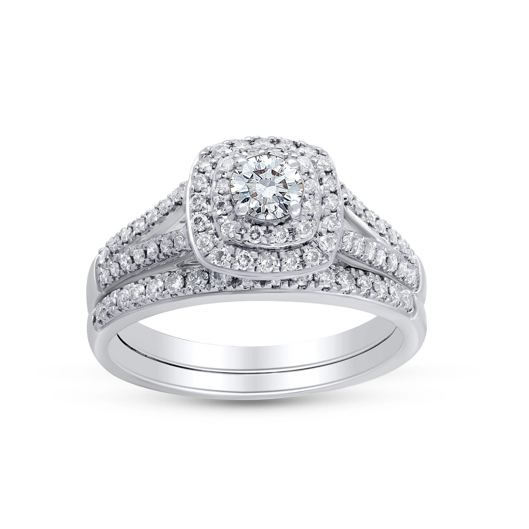 A delightful engagement ring studded with 78 diamonds in pong and micro prong setting. The ring is crafted in 14 Karat white gold, diamonds are graded K-L Color, I1-I2 Clarity. 

Metal color and ring size can be customized on request.