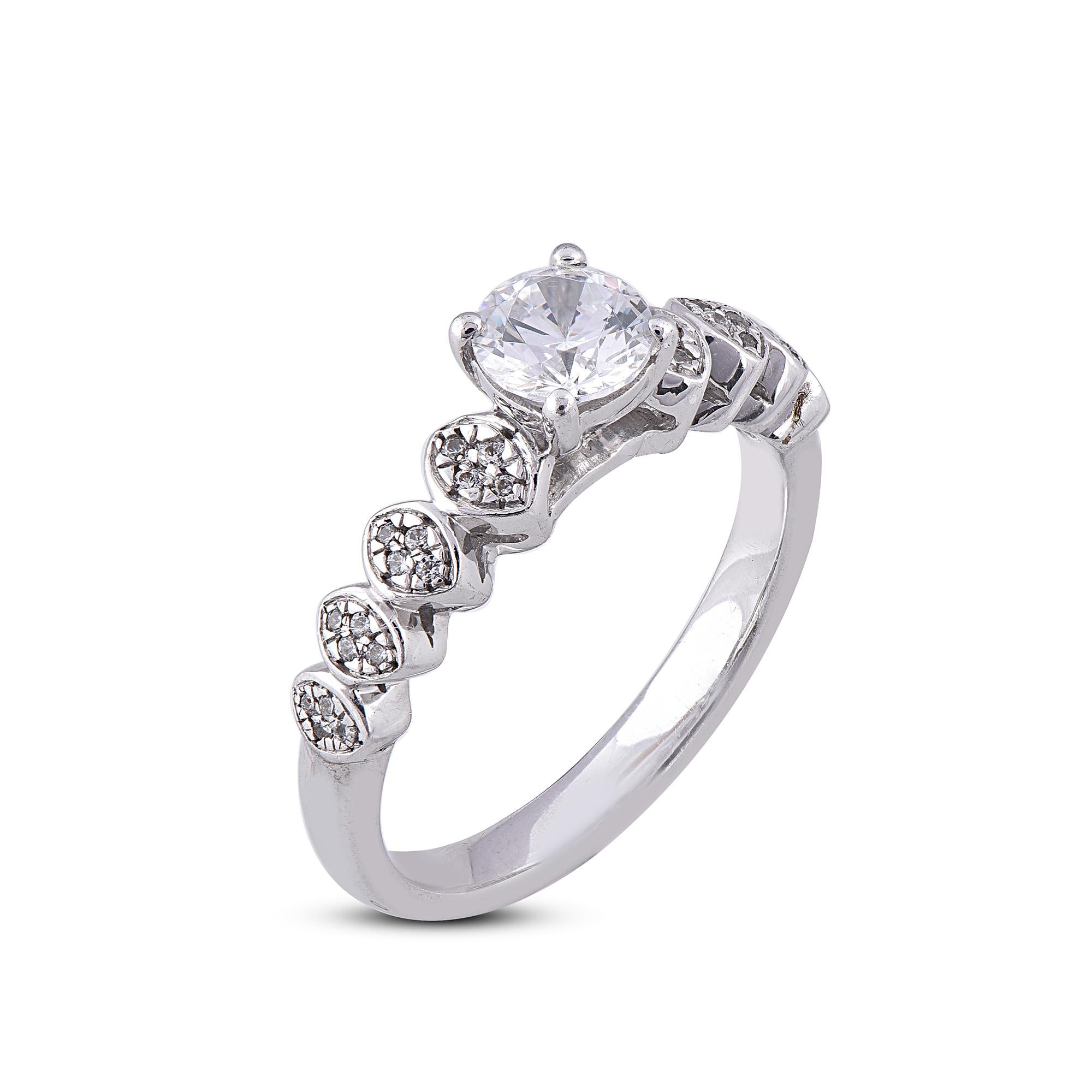 Truly exquisite, this diamond engagement ring is sure to be admired for the inherent classic beauty and elegance within its design. This engagement ring features 0.63 carat center stone of 33 round diamond studded in prong and pave setting. The