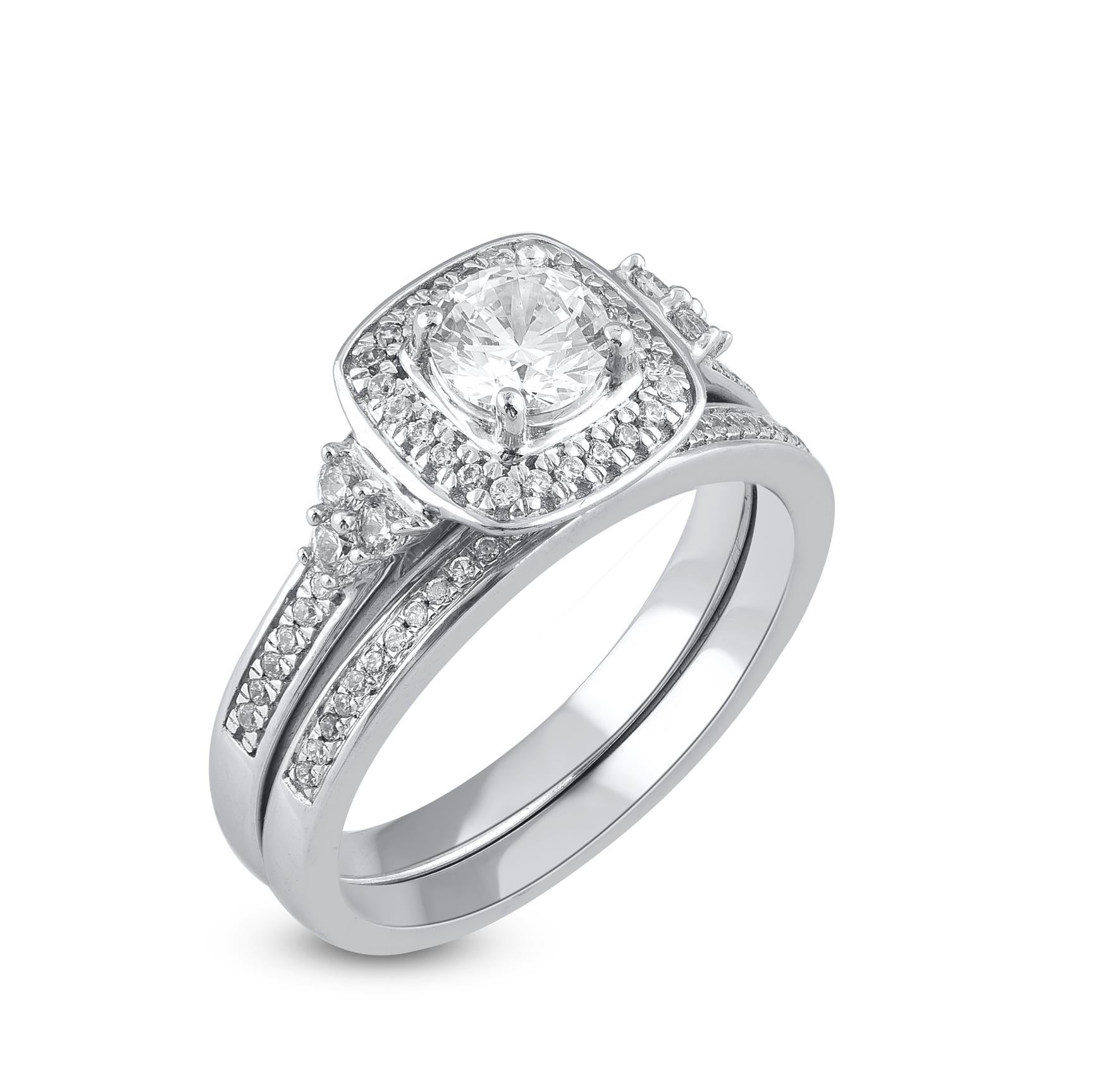 Crea ricordi che dureranno tutta la vita con questa parure da sposa con cuscino di diamanti. Realizzato in oro bianco 14 carati. Questa fede nuziale è caratterizzata da 72 diamanti rotondi taglio singolo e taglio brillante splendidamente incastonati