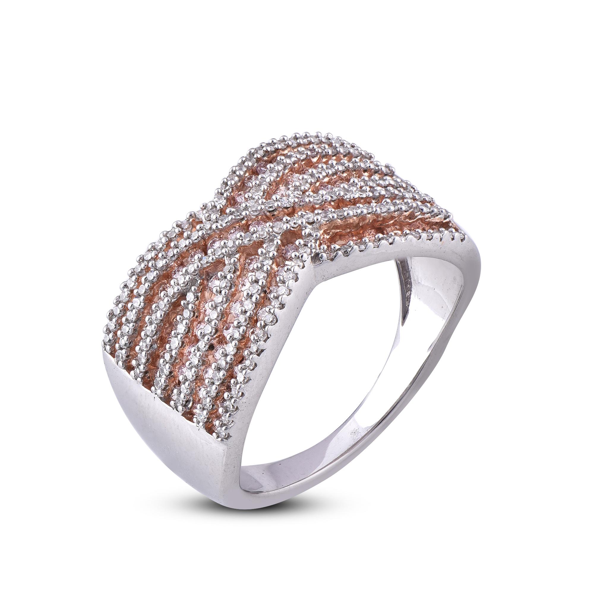 This Crisscross Diamond wedding band in 18K white gold showcases 0.86 carats of sparkling 168 round and 87 pink diamonds accentuated in prong and channel setting, H-I color I1 clarity. Featuring a crisscross design and a highly polished gold finish,