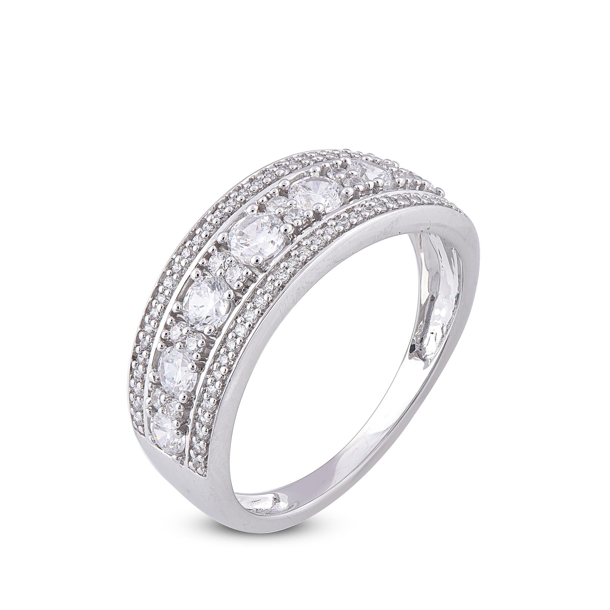Round Natural Diamond Wedding Band Ring adds a touch to sophistication to your style with this 14 Karat White Gold. This ring features 77 Round White Diamonds set in prong and pave setting a beautiful design forming a unique pattern. This ring has