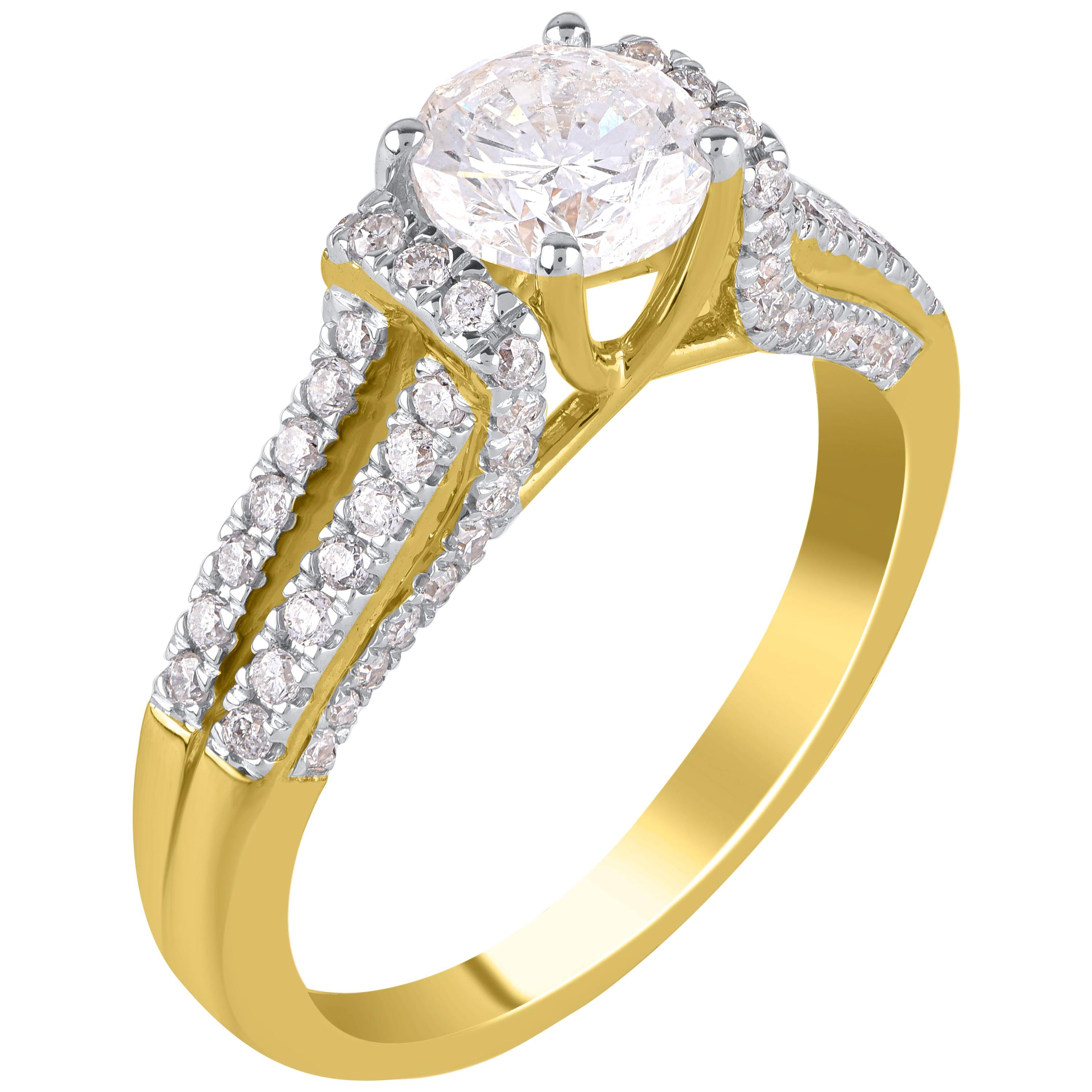 A gorgeous diamond split shank engagement ring, crafted in 18 KT yellow gold. This split shank ring is studded with 75 round-cut diamonds in prong and micro-prong setting, and diamonds are graded GH Color, SI1 Clarity.
