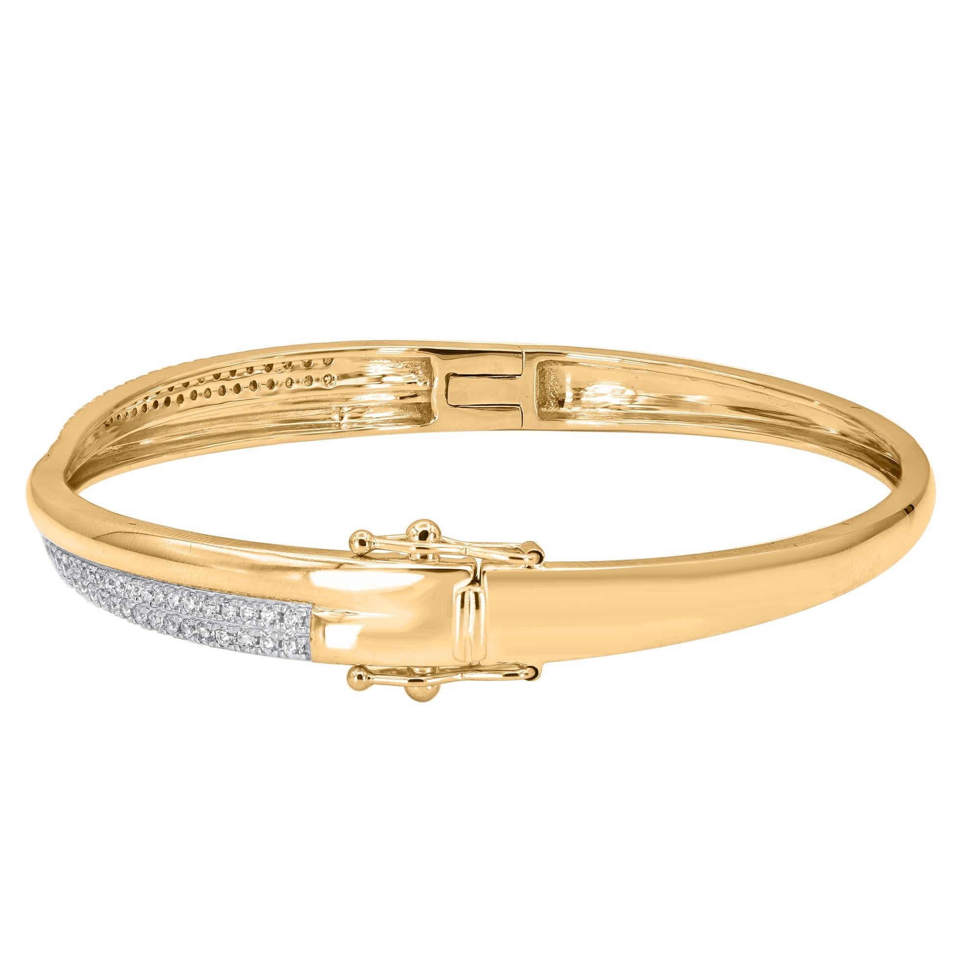 Classic and sophisticated, this diamond bangle bracelet pairs well with any attire.
This Shimmering bangle bracelet features 78 natural single cut & brilliant cut diamonds in prong setting and crafted in 14 kt yellow gold. Diamonds are graded H-I