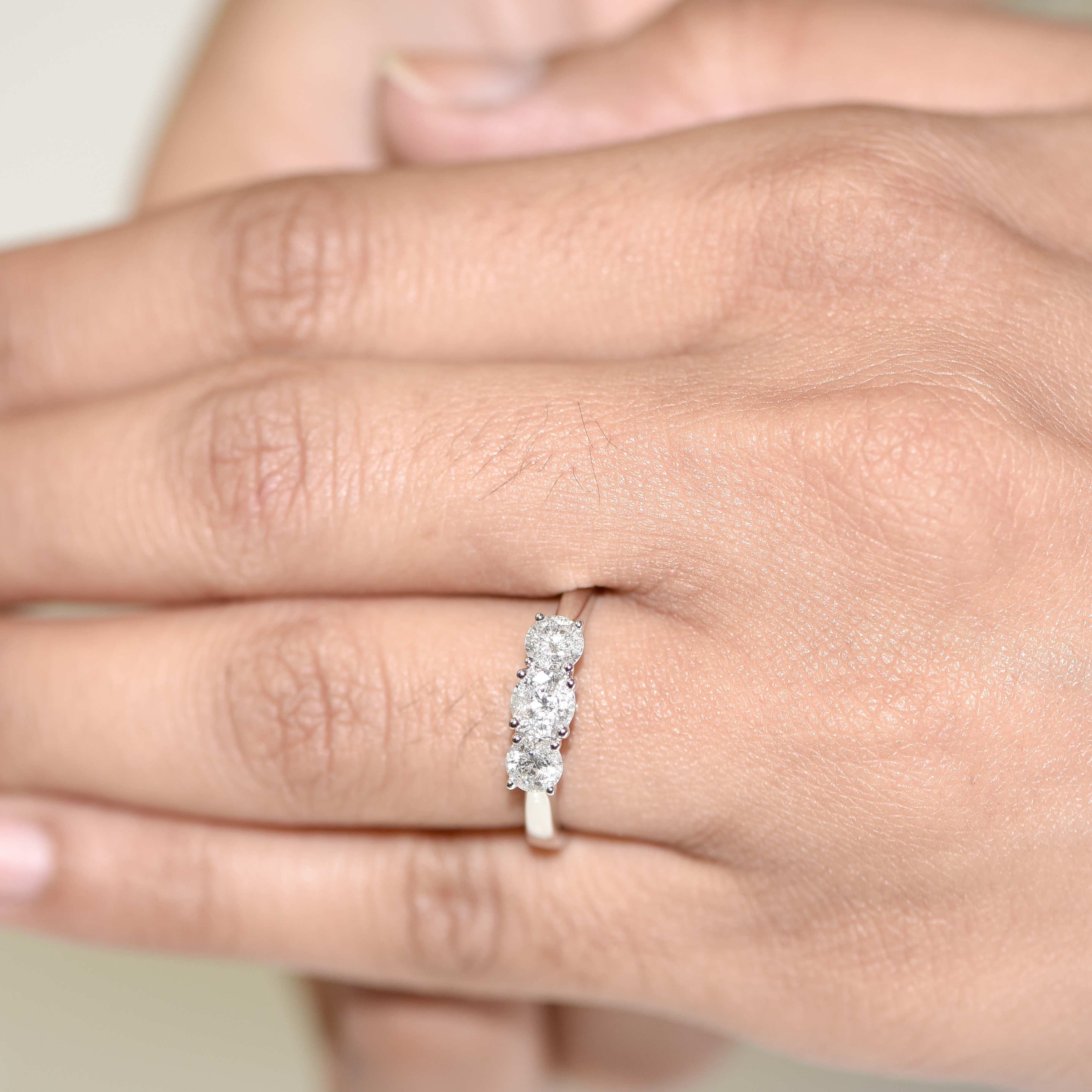 classic three stone engagement ring