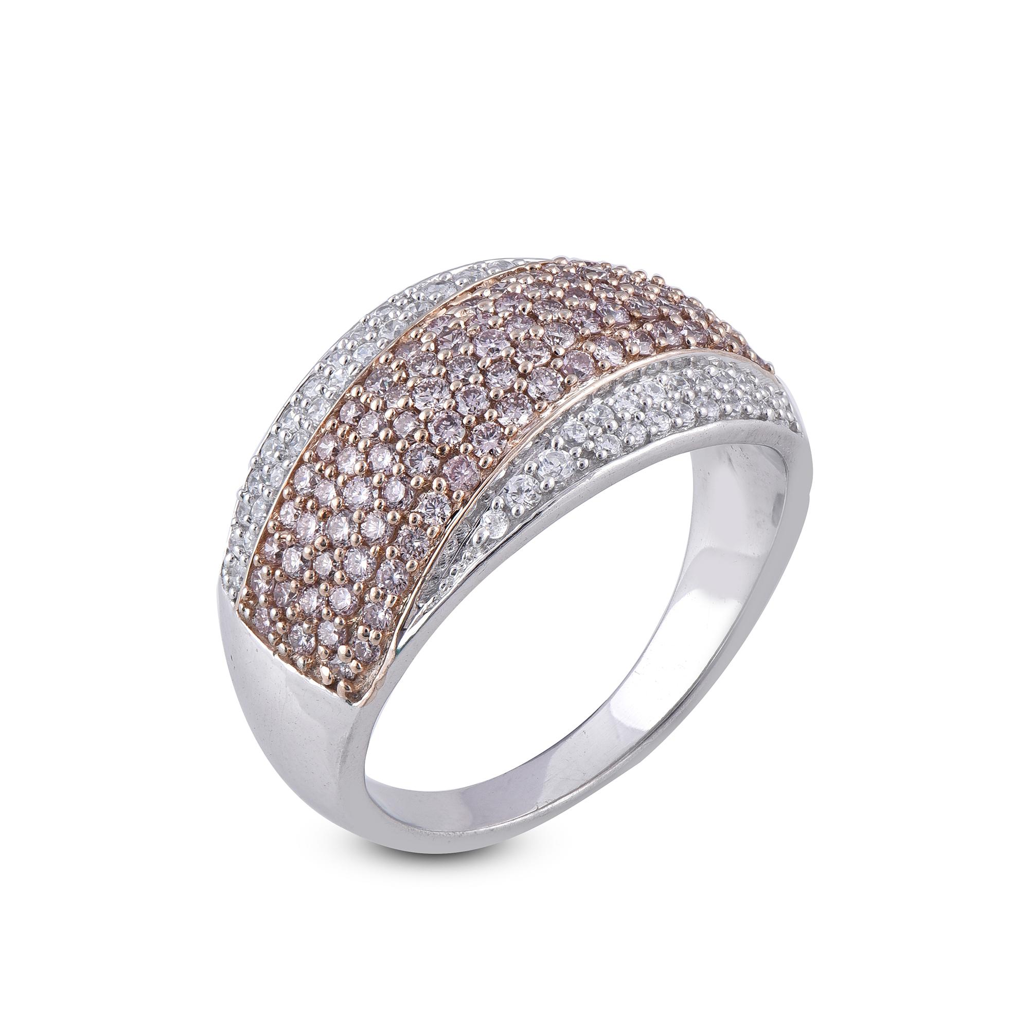 With one look of this 1.01 Carat Round diamond multi row wedding band crafted in 18 kt white gold. This band is beautifully designed and studded with 44 white and 93 pink diamond in pave setting. We only use 100% natural diamond which shines in H-I