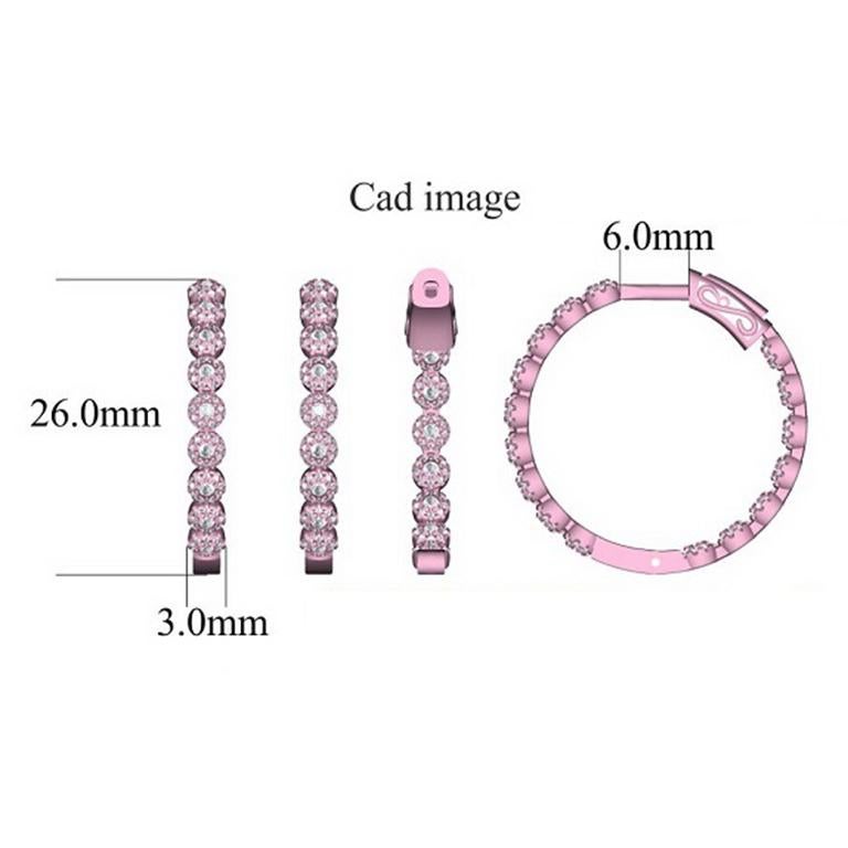 These exquisite diamond inside-out hoop earrings offer beauty equaled only to her own. These earrings are crafted in 14 karat rose gold and features 320 round diamond set in micro-prong setting. These timeless cluster stud earrings  secure