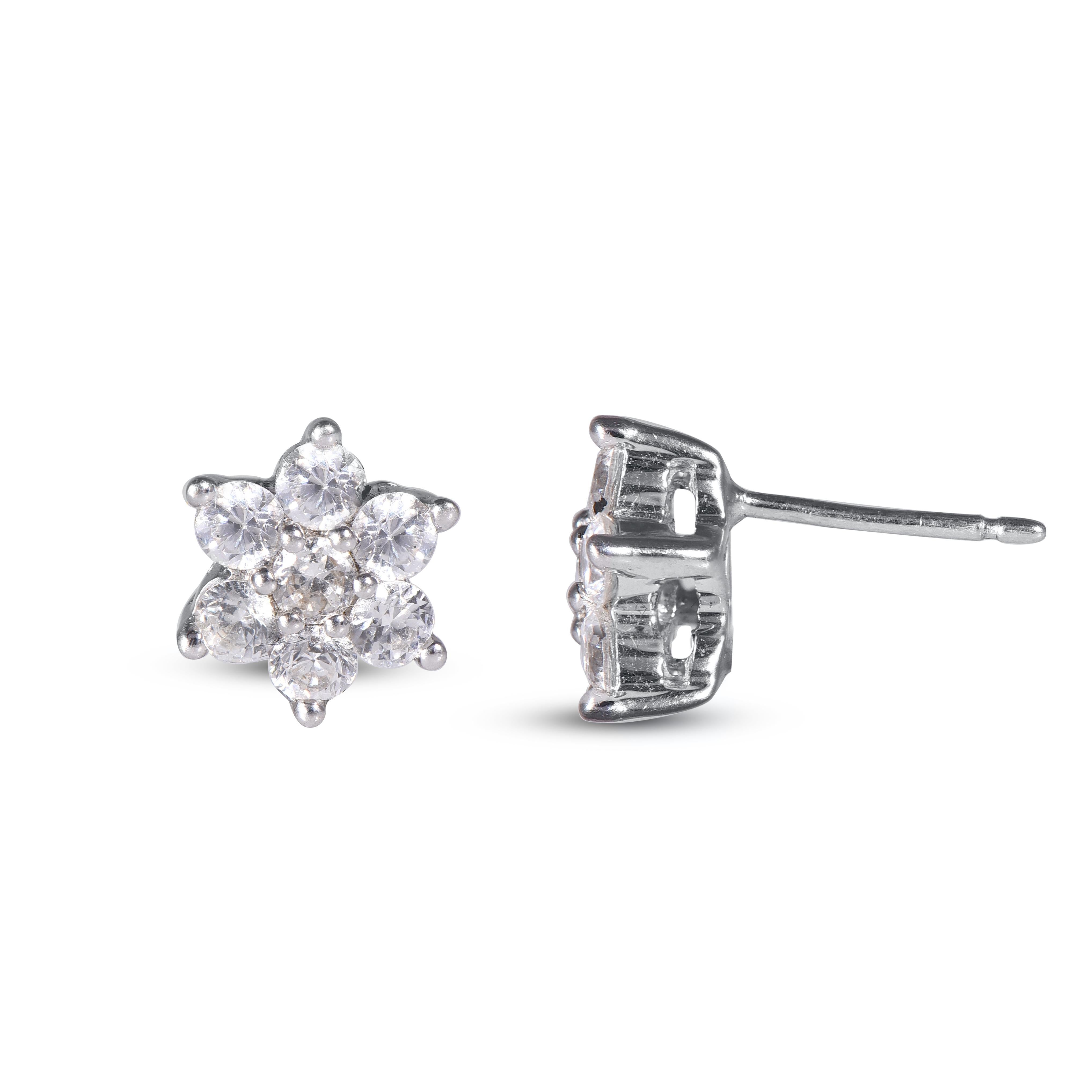 18 Karat White Gold Composite Diamond Stud Earrings With 14 Round Brilliant Diamonds timeless Diamond cluster stud earrings have 1.00 Carats of Round Brilliant set in prong setting, H-I color SI1-2 clarity. These sparkling stud earrings secure