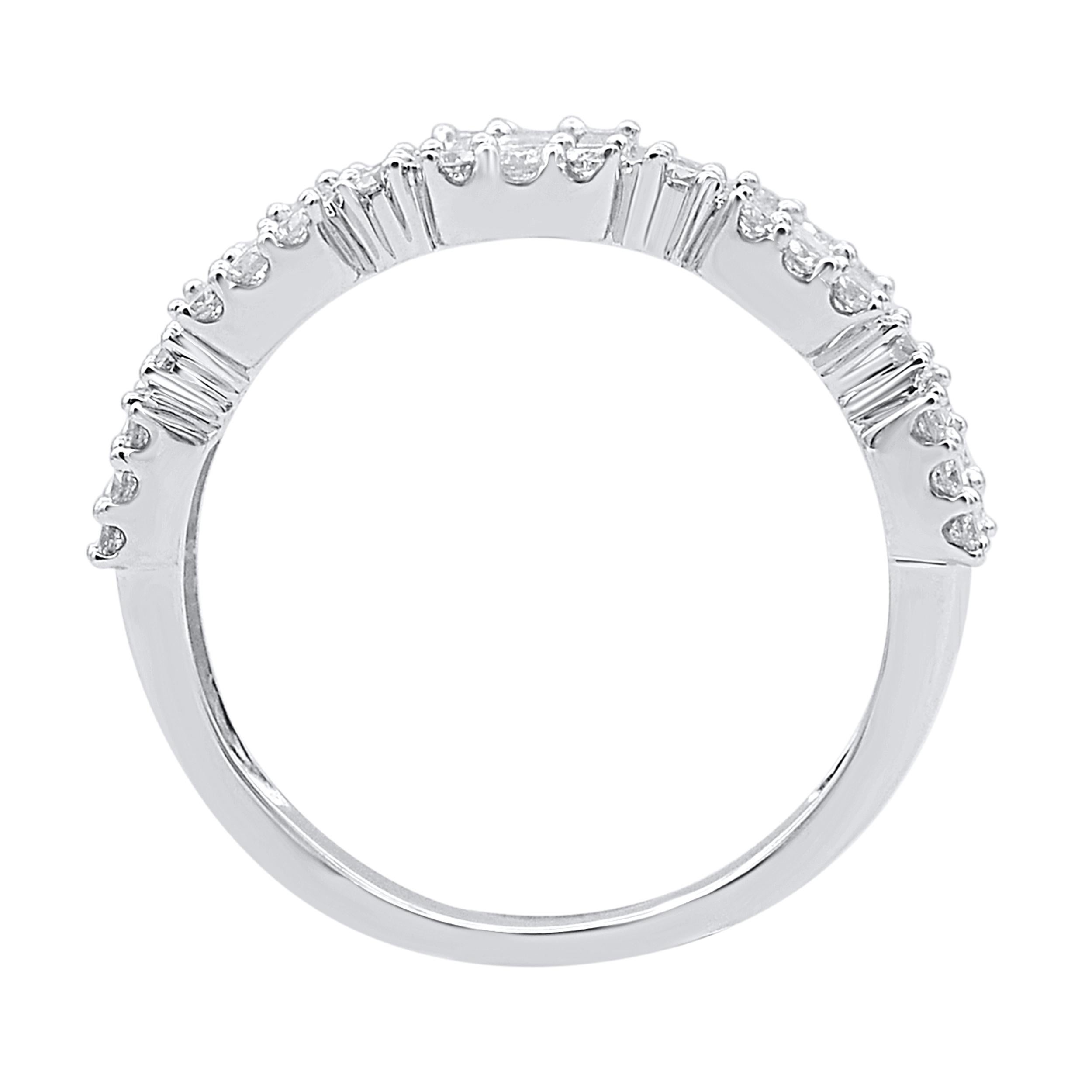 Give a touch of glamour to your fine jewelry collection with this engagement band ring. These beautiful ring is crafted in 14KT white gold, and studded with 53 brilliant  cut and baguette cut natural diamonds in prong setting. The total diamond
