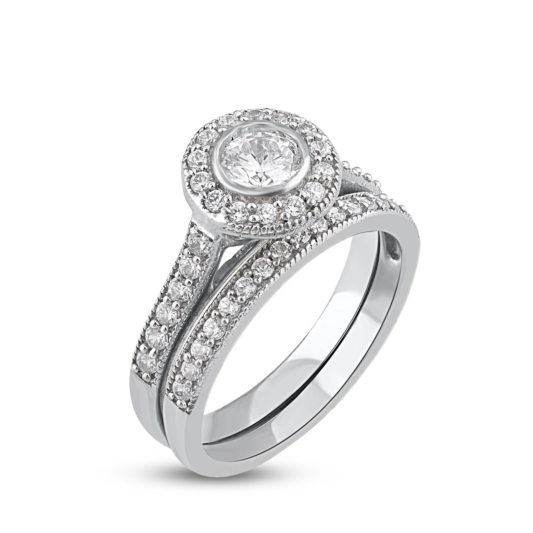 Express your love for her in the most classic way with this diamond ring set. Crafted in 14 Karat white gold, This wedding ring features a sparkling 44 brilliant cut round diamond beautifully set in bezel & pave setting. The total diamond weight is