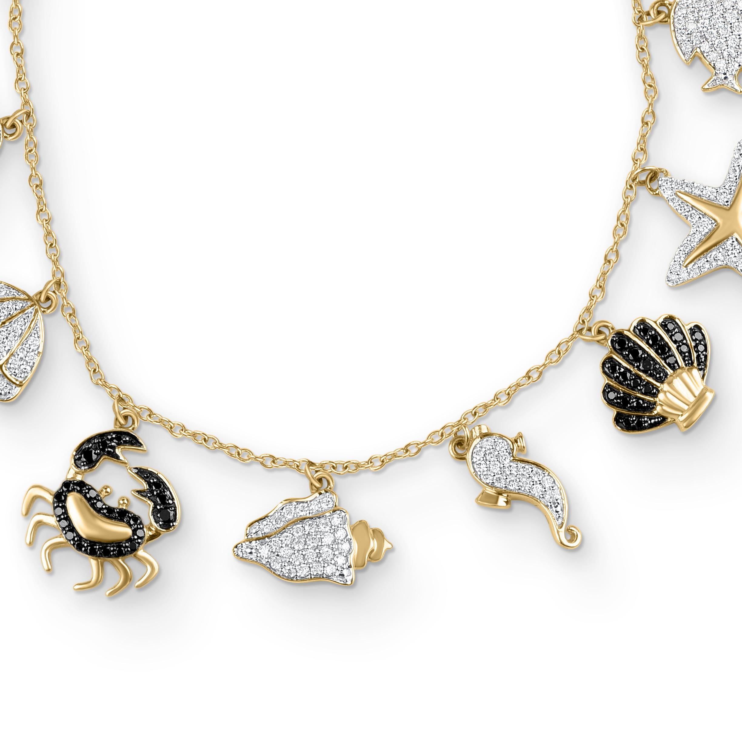 Adorn your wrist with this sparkling aquatic life charm bracelet. Crafted in 18-karat yellow gold and studded with 432 brilliant natural white and black diamonds set in pave setting. The diamonds are graded H-I Color, I1 Clarity. The length of the