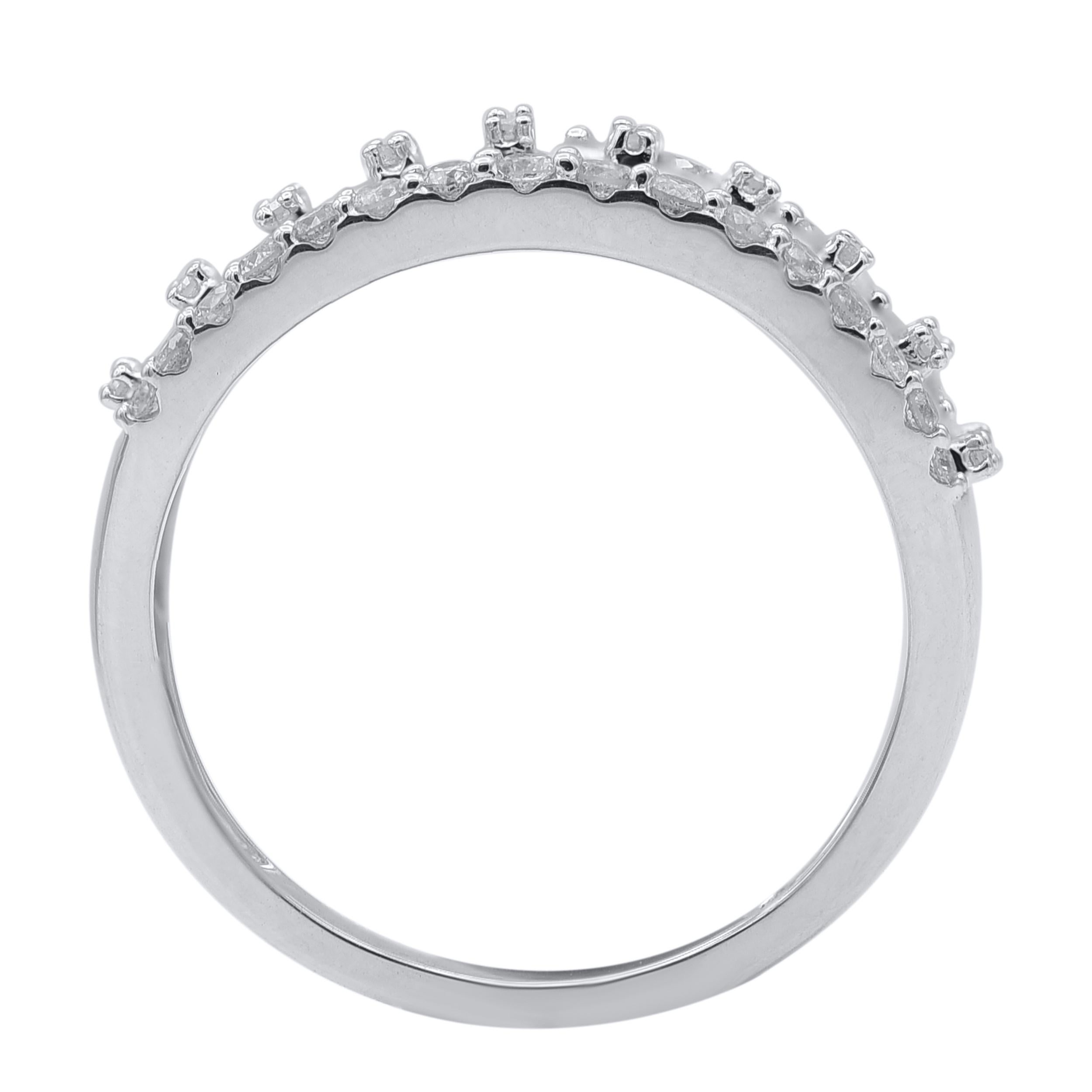 Bring charm to your look with this diamond ring. This beautiful ring is crafted in 14KT white gold, and studded with 118 single cut, brilliant cu and baguette cut natural diamonds in prong and channel setting. The total diamond weight of these