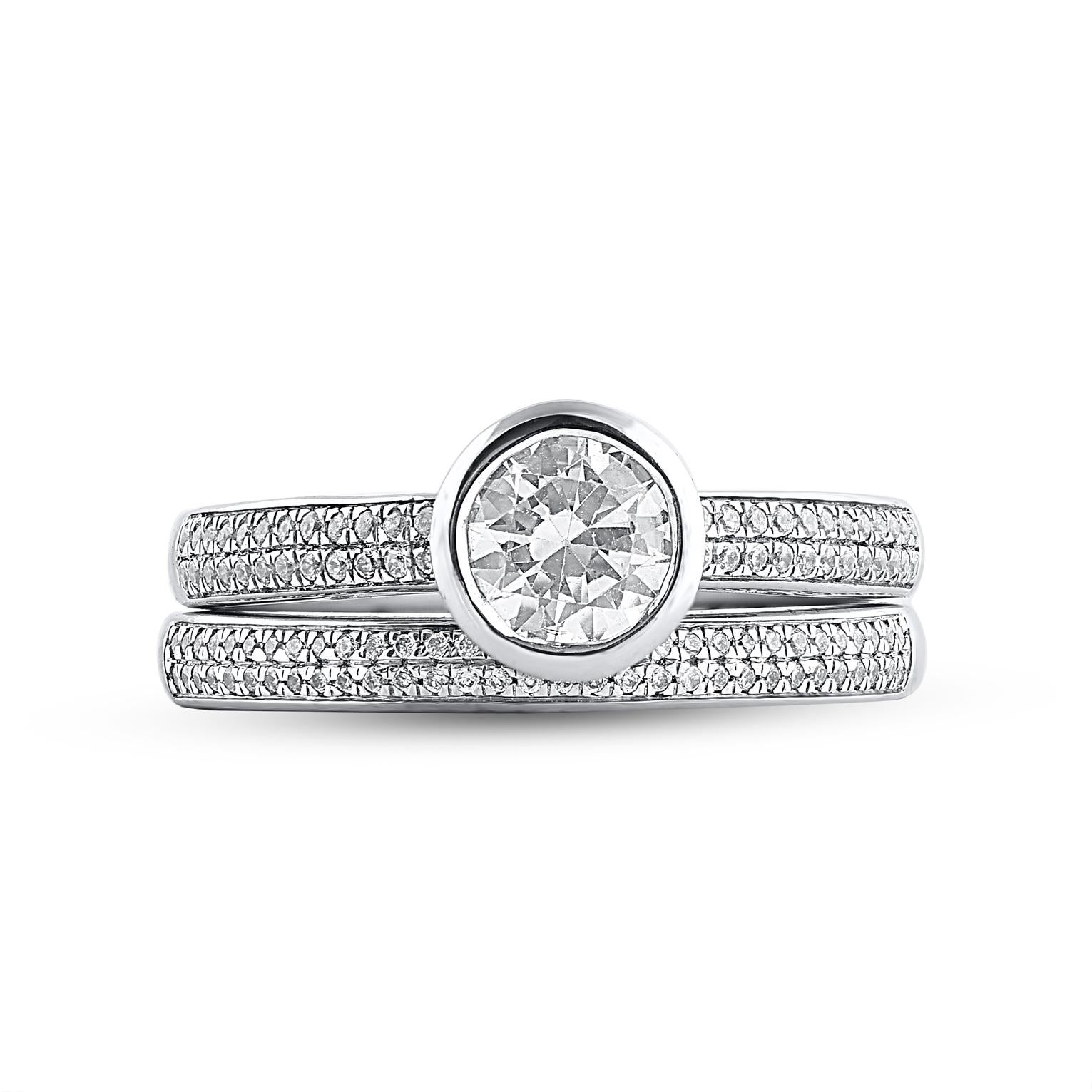 On that special day, express all your love with this classic and dazzling diamond bridal set. Crafted in 14 Karat white gold. This wedding ring features a sparkling 109 brilliant cut and single cut round diamonds beautifully set in prong & pave