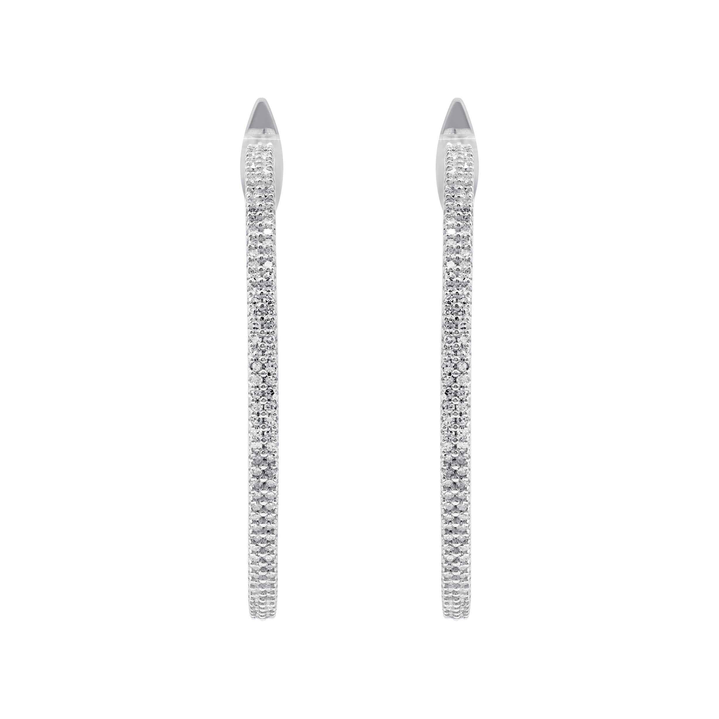 Sparkling inside-out diamond hoop earrings are intricately hand-crafted in 14 Karat white gold and features 360 round diamonds set elegantly in prong setting. The diamonds are graded as H-I Color, I-2 Clarity. Total diamond weight is 1.0 carat.