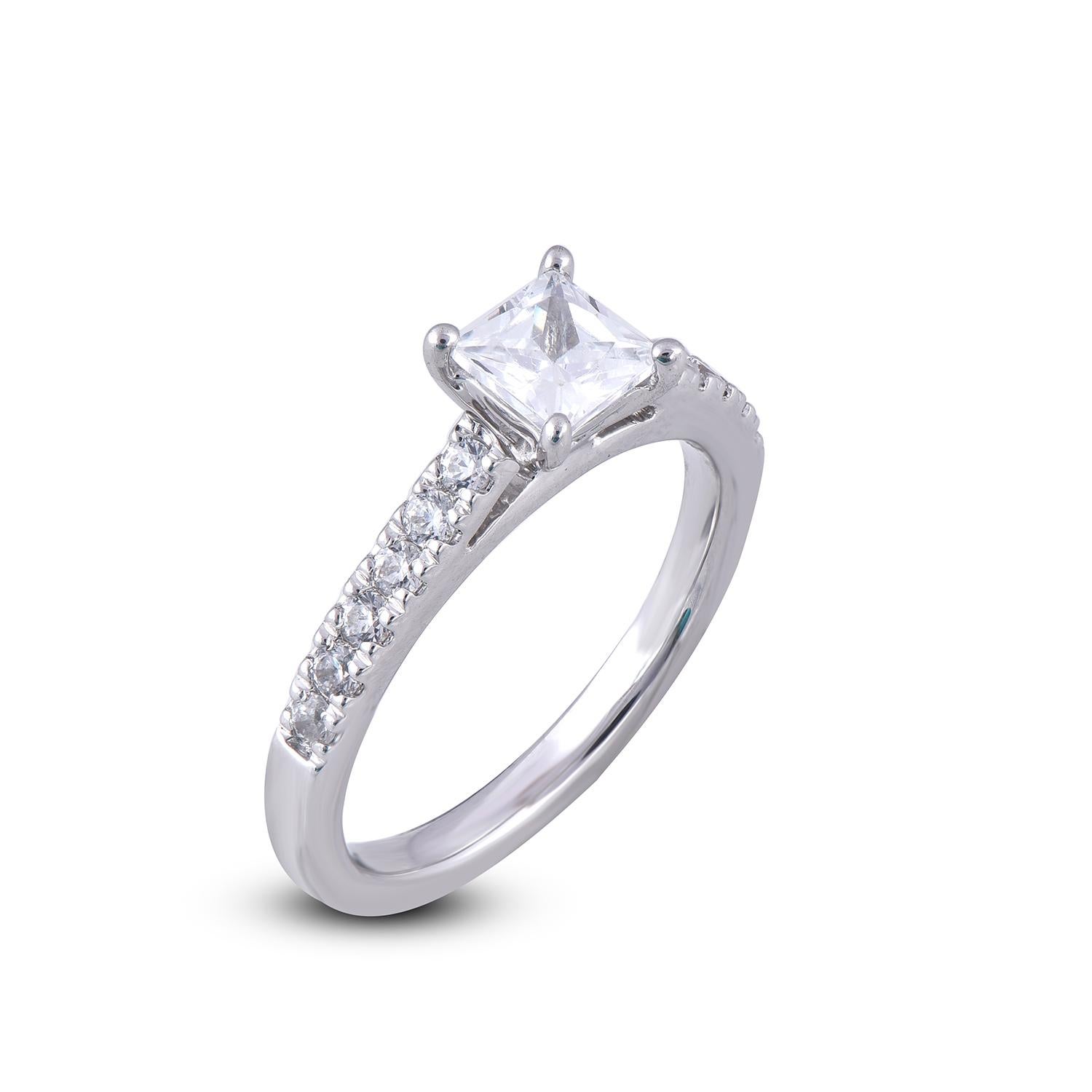 This diamond engagement ring is expertly crafted in 18 Karat White Gold and features 0.75 ct center Princess Diamond and 0.25 ct of diamond on shank lined diamonds set in prong setting. The diamond are natural, not treated and dazzles in G-H color