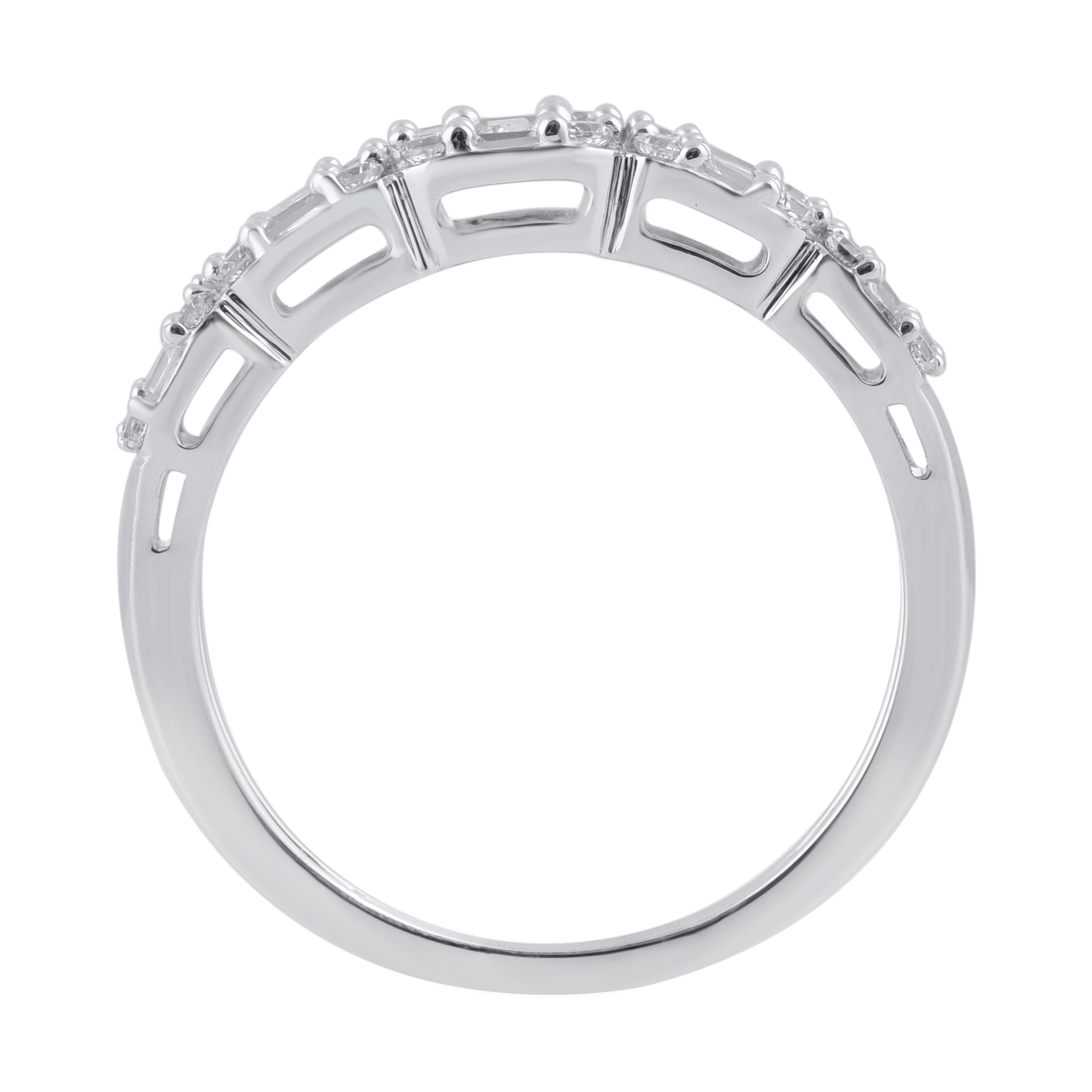 Modern and mesmerizing, these wedding band diamond ring are an eye catchy look for any occasion. Embedded with 45 brilliant cut round diamonds and baguette diamonds set in prong setting and crafted in 14 karat white gold. Captivating with 1.0 carat