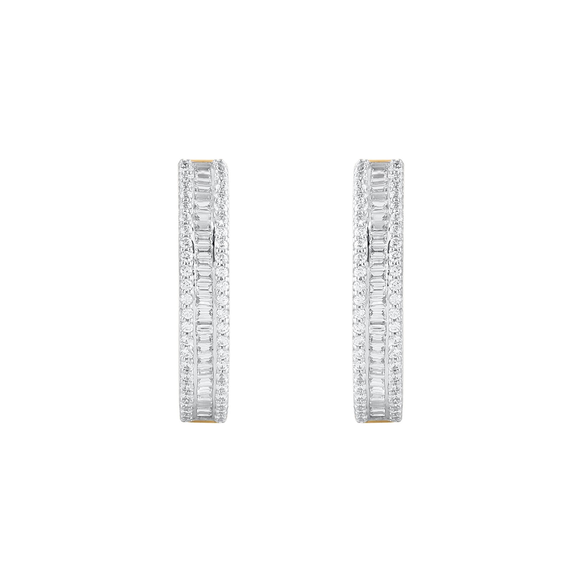 Enhance your day or evening looks when you wear these diamond hoop earrings. Crafted in 14 karat yellow gold with 168 single cut round & baguette diamond in prong & channel setting. Total diamond weight is 1.0 carat. These earrings secure with