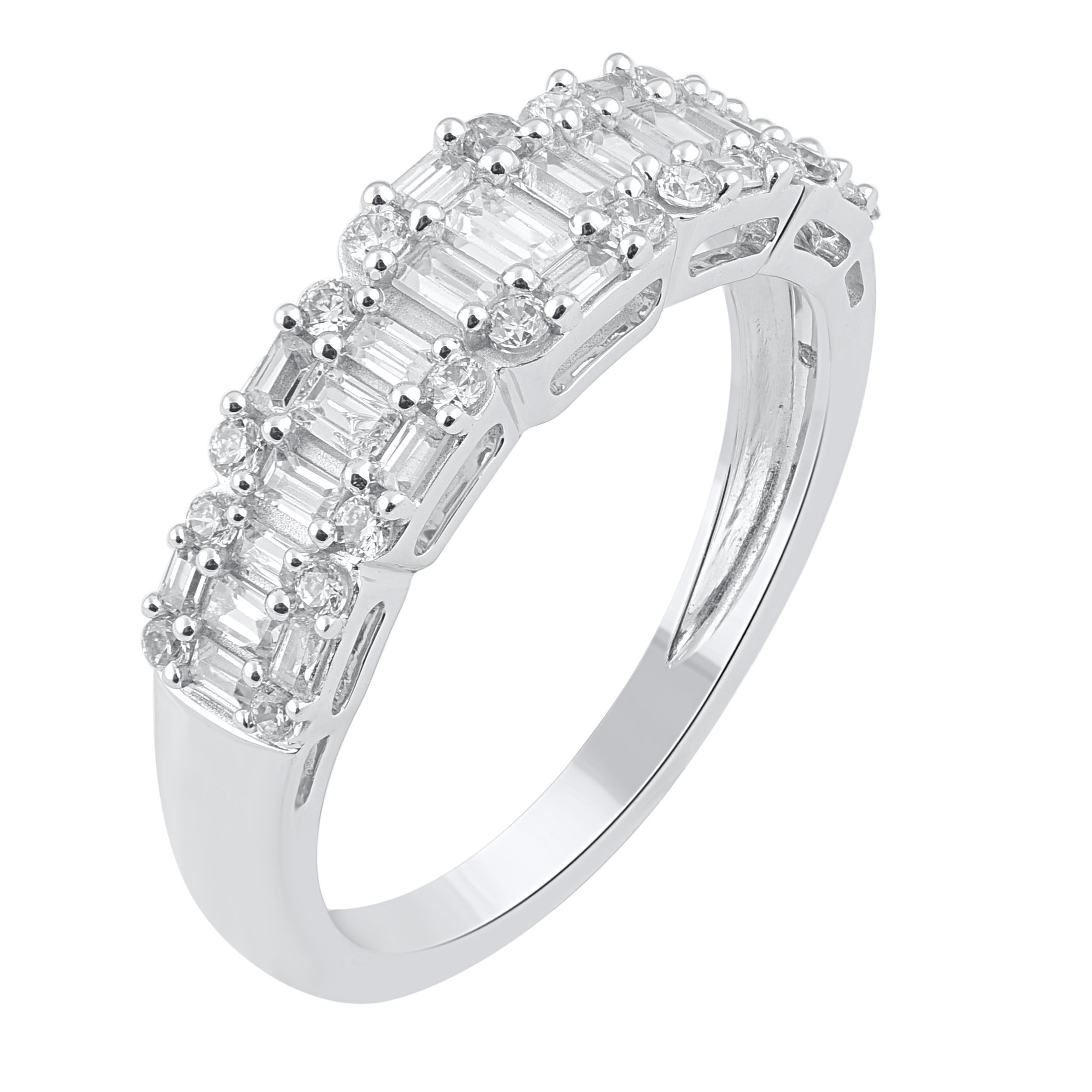 Modern and mesmerizing, these wedding band diamond ring are an eye catchy look for any occasion. Embedded with 45 brilliant cut round diamonds and baguette diamonds set in prong setting and crafted in 18 karat white gold. Captivating with 1.0 carat