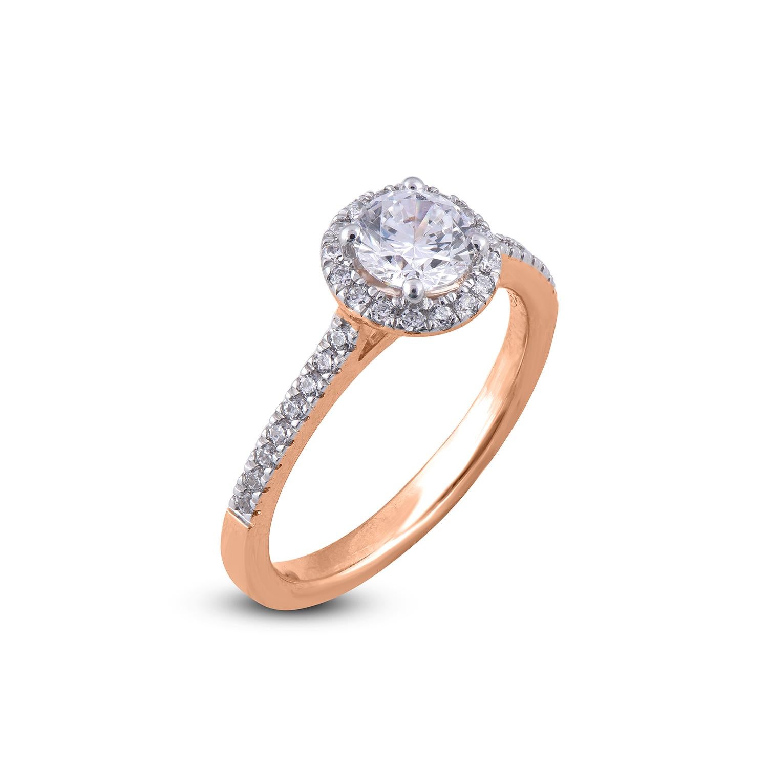 A graceful addition to her wardrobe, this design crafted in 18 Karat Rose gold and it's features 0.75ct of center stone and 0.25 ct of frame and shank lined 33 round and diamond set in prong setting. The diamond are natural, not treated and dazzles