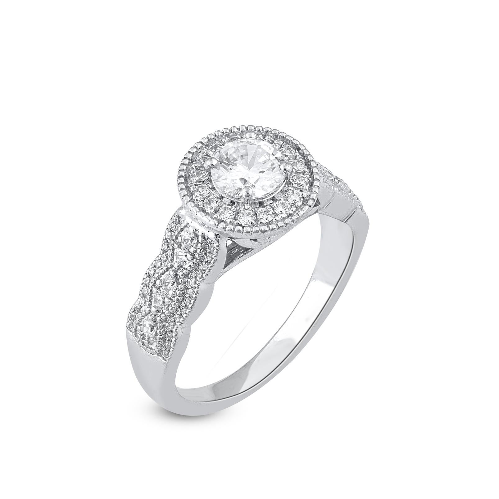 A ravishing look she'll love to wear, this striking diamond bridal set is dazzling symbol of your commitment. Made by our skillful craftsmen in 18 karat white gold, it showcase 0.60 ct center stone and 0.40 ct of 78 round small diamond lined on