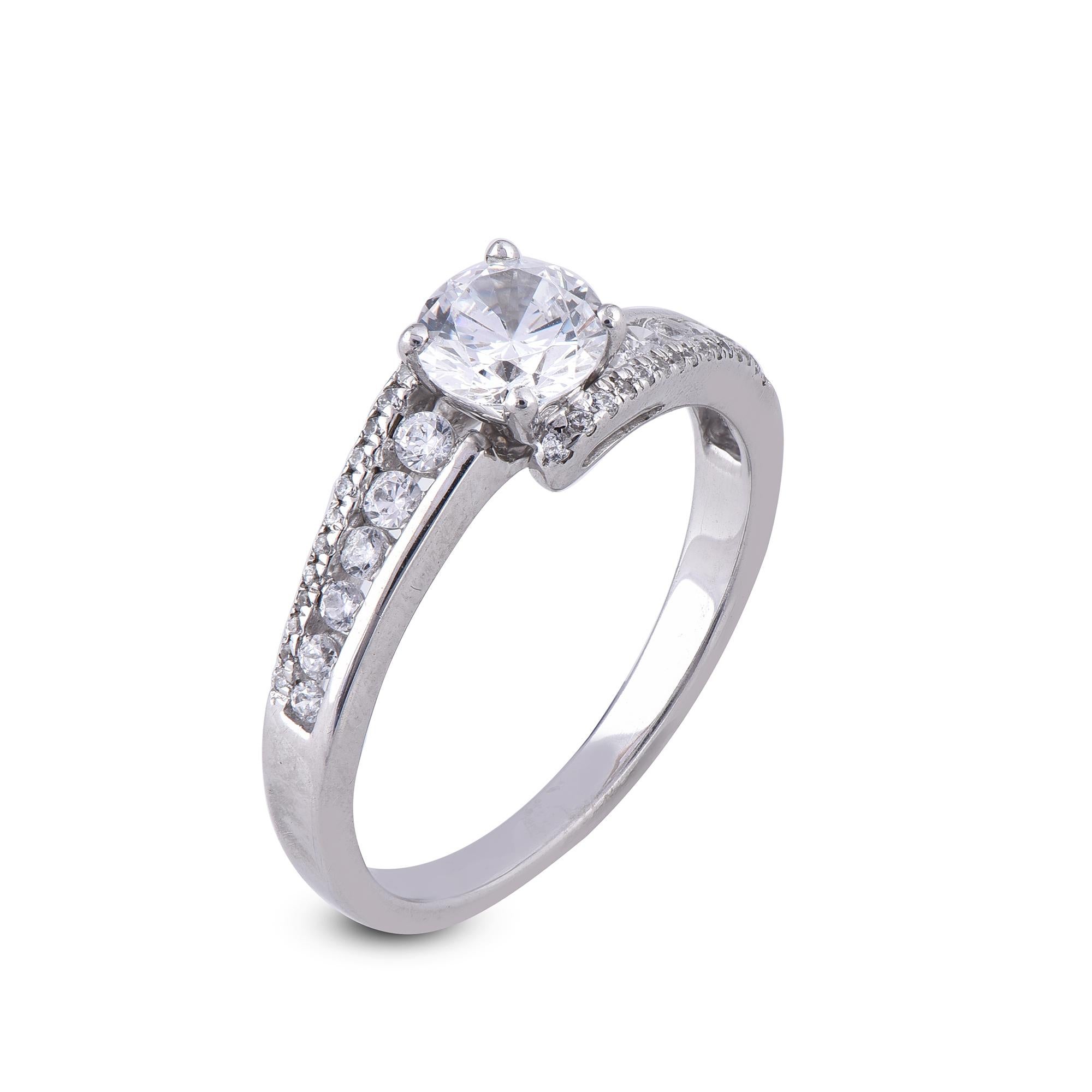 This engagement ring features 0.70 ct of center stone and 0.30 ct of lined diamonds. Expertly Crafted of sparkling 18 karat white gold in high polish finish and set with 43 sparkling round and cut diamonds set in channel and prong setting, G-H Color