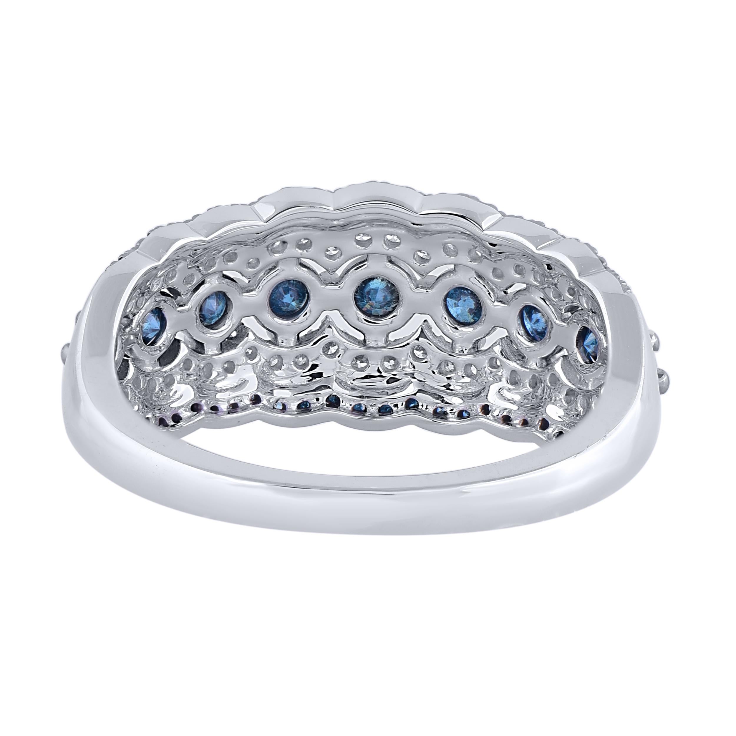 Elegantly designed by our skillful artisans in 14 Karat white gold and studded with 109 brilliant cut round white diamond and blue treated diamond in prong setting. Total diamond weight is 1.0 carat. Diamonds are graded H-I color, I-2 clarity. An