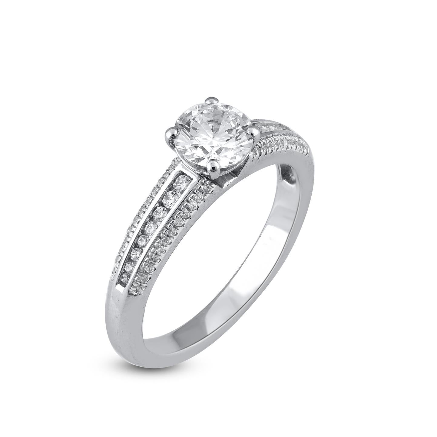 Wow her with the scintilating look of this diamond ring. This engagement ring features 0.80 ct of Centre stone and 0.20 ct shank lined diamonds is beautifully designed and studded with 64 round diamond set in prong and channel setting. We only use