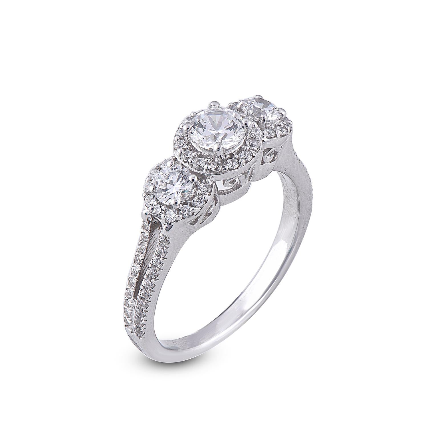 There is no definition to show your love, This ring is designed in 18 karat White Gold and features with 67  Round White diamonds 0.39ct of centre stone and each side diamond is 0.145 ct is secured with prong and micro pave settings. it shines with