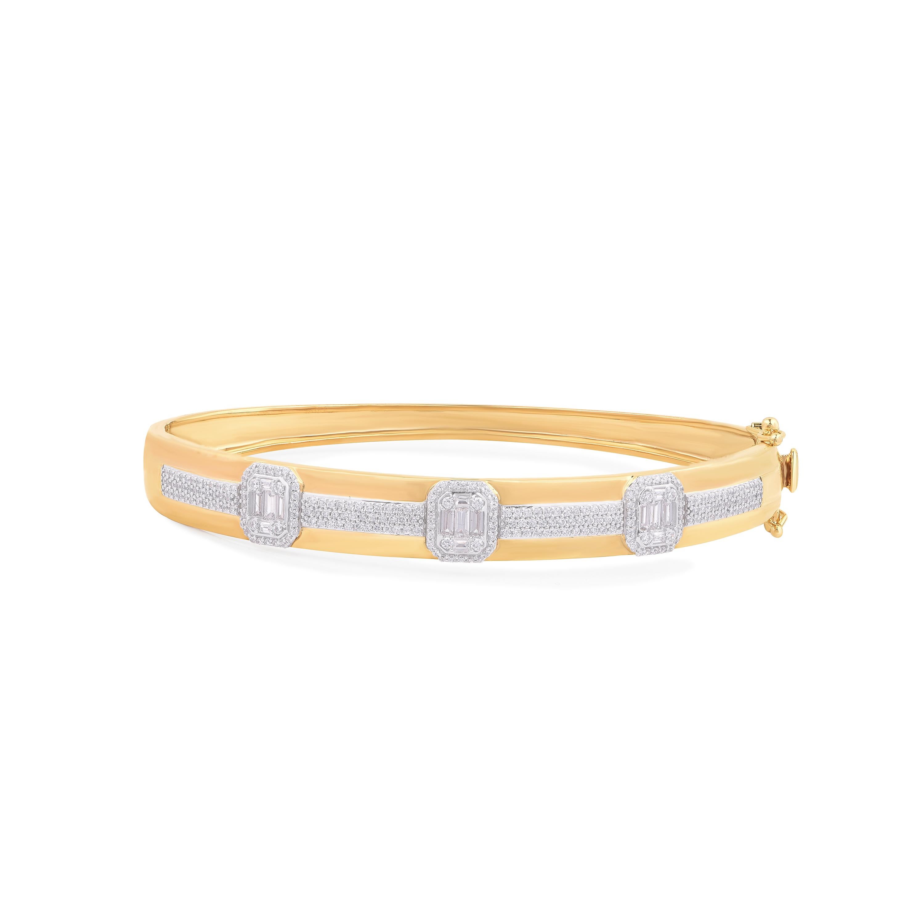 This diamond bangle is studded with 234 brilliant and 15 baguette cut diamonds elegantly set in pave, prong and channel setting - crafted by our inhouse experts in 18-karat yellow gold. The diamonds are graded H-I Color, I2 Clarity. 

Metal color