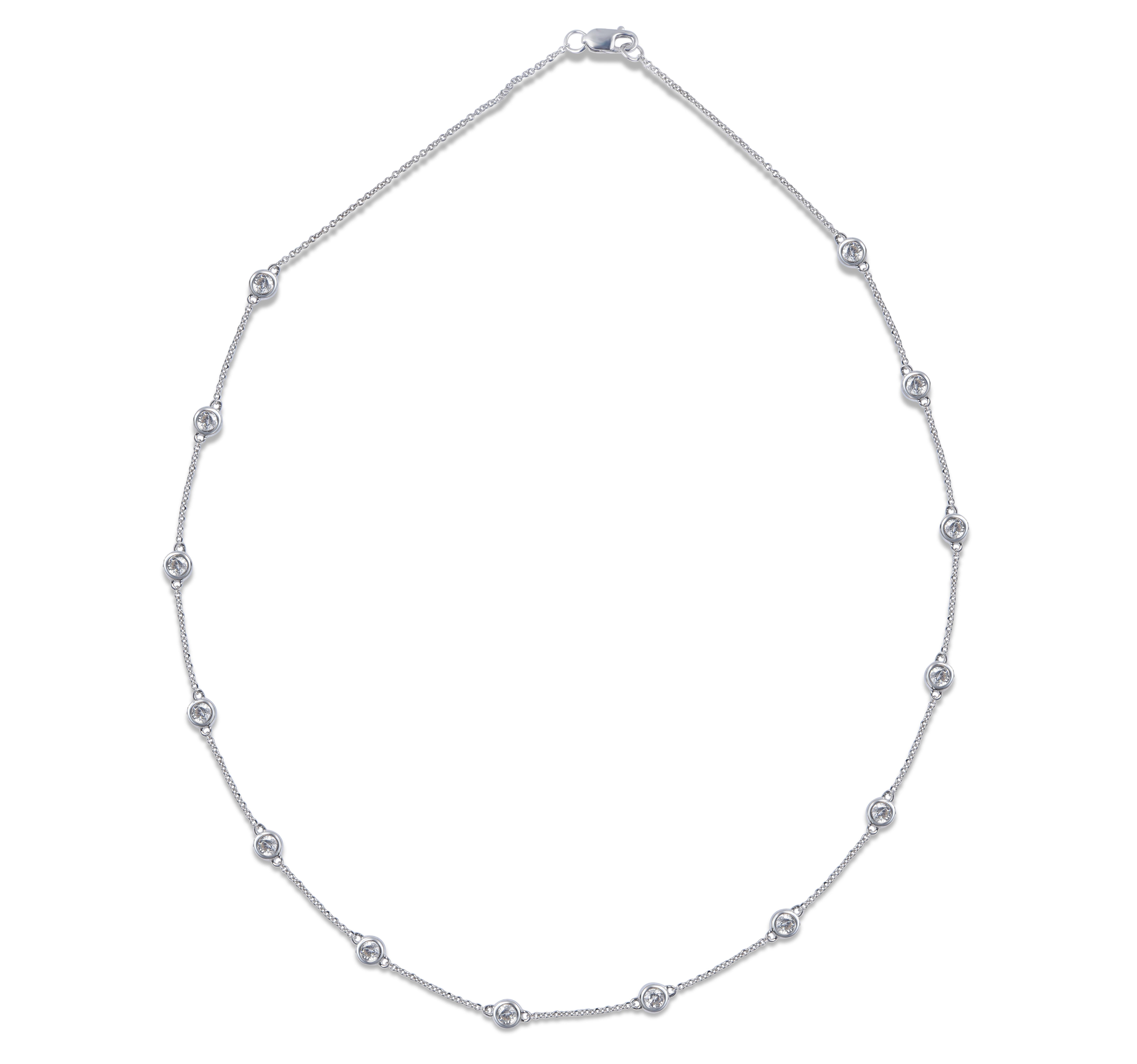 Beautifully hand-crafted by our skillful craftsmen in 14-karat white gold, features 14 brilliant-cut diamonds studded beautifully in pave setting. The diamonds are graded HI Color, I1 Clarity. Comes along with 18-inch cable chain.