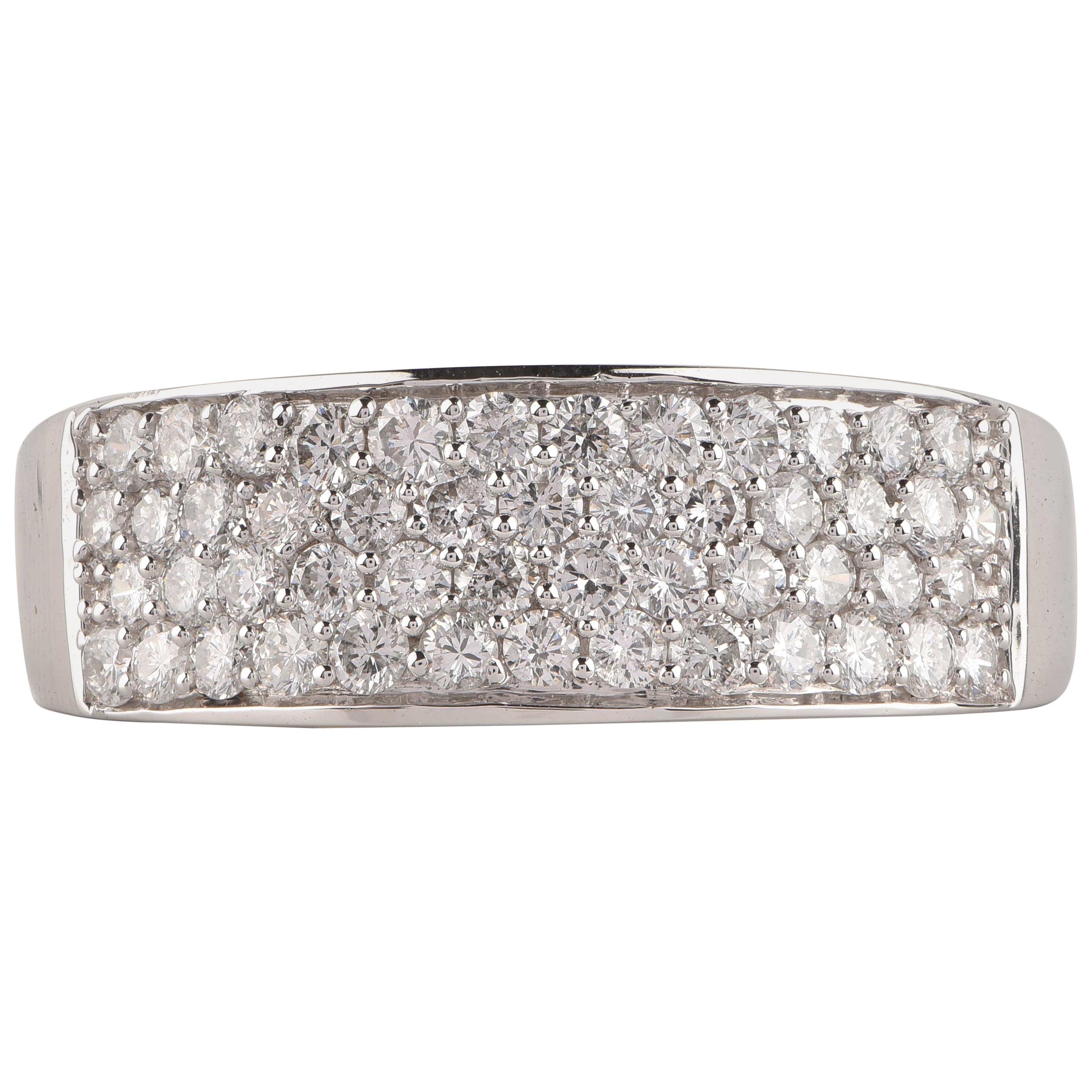 The anniversary ring shines brightly with 50 brilliant-cut diamond set in micro-pave setting and elegantly crafted in 18-karat white gold. The diamonds are graded H-I Color, I2 Clarity. 

Metal color and ring size can be customized on request.