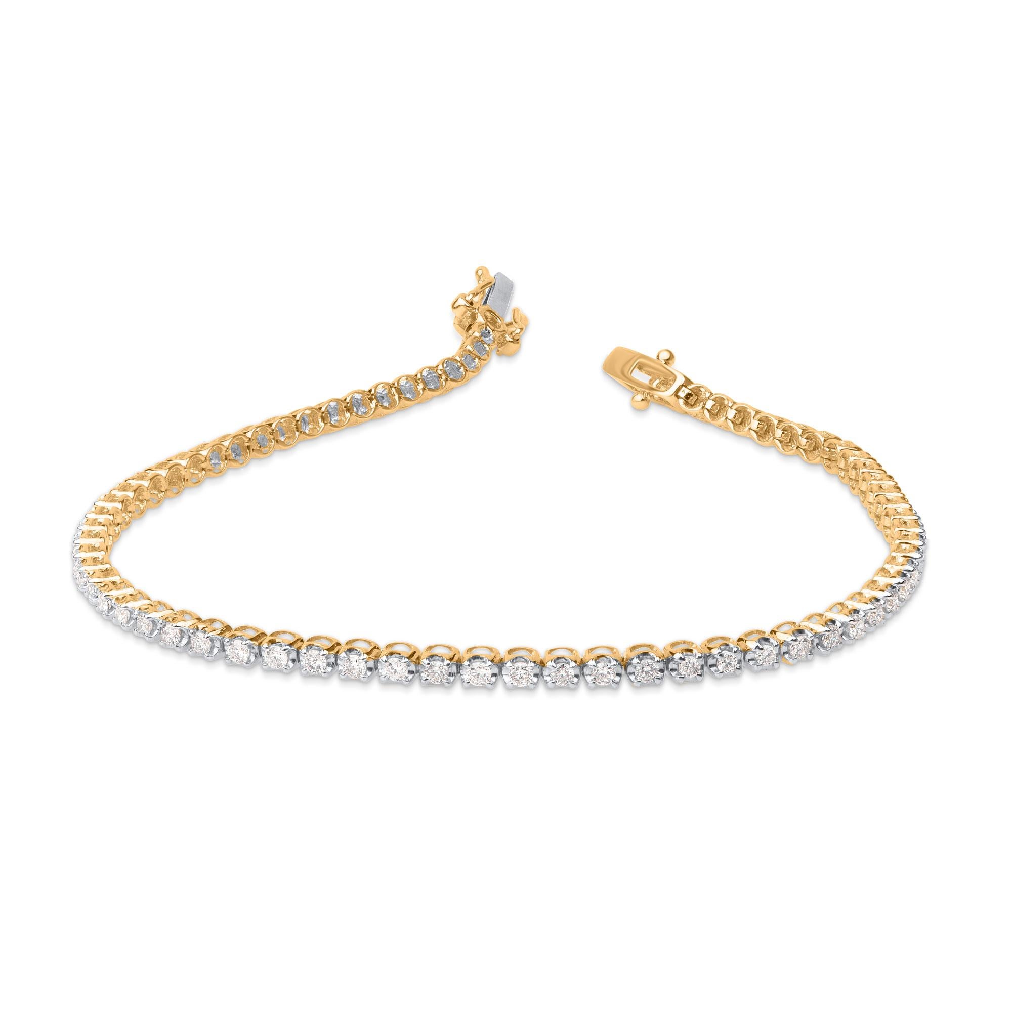 A classic tennis bracelet – perfect accessory for women with everyday attire. Elegantly designed in 10 kt yellow gold and embellished with 72 brilliant natural diamonds in prong setting. Diamonds are graded H-I Color, I2 Clarity. 
