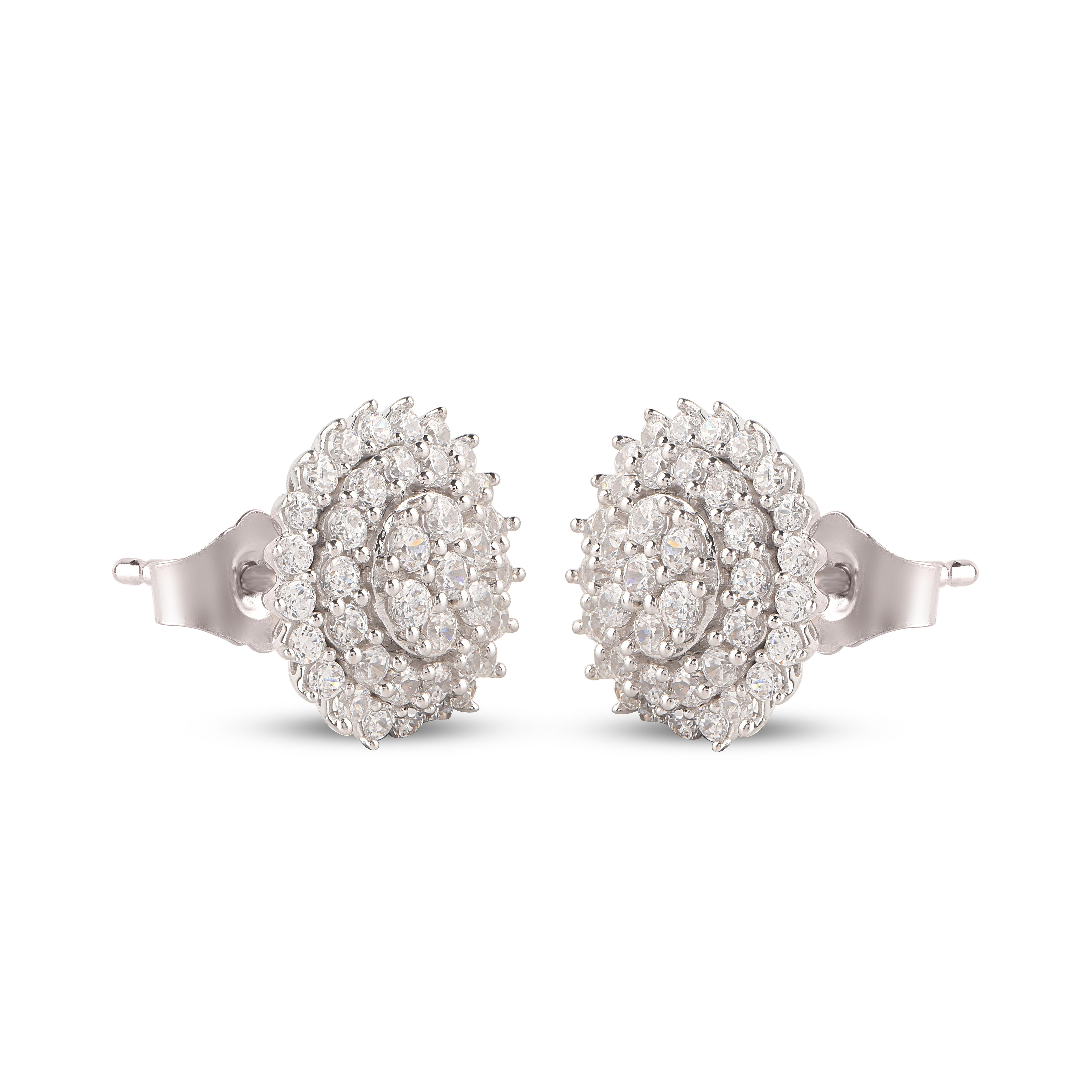 Blooming with sparkle, these dazzling diamond floral stud earrings are embellished with 84 brilliant cut diamonds set in prong setting and designed in 18-karat white gold. The diamonds are graded H-I Color, I2 Clarity. 

They secure comfortably with