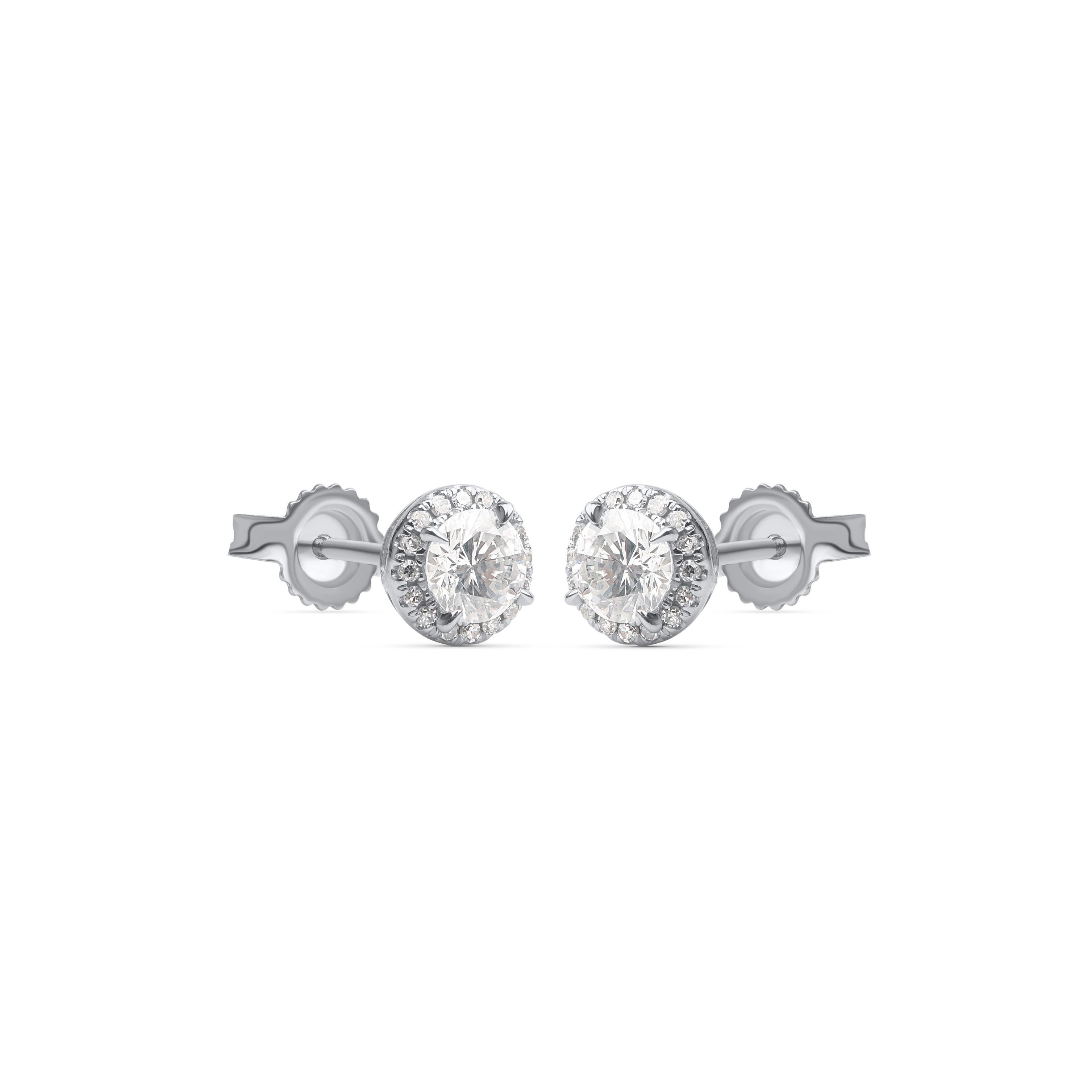 These stud earrings feature 36 natural brilliant cut diamonds set in prong setting and are handcrafted by our in-house experts, crafted in 10-karat white gold. These diamond stud earrings look classic and elegant. The diamonds are graded H-I Color,