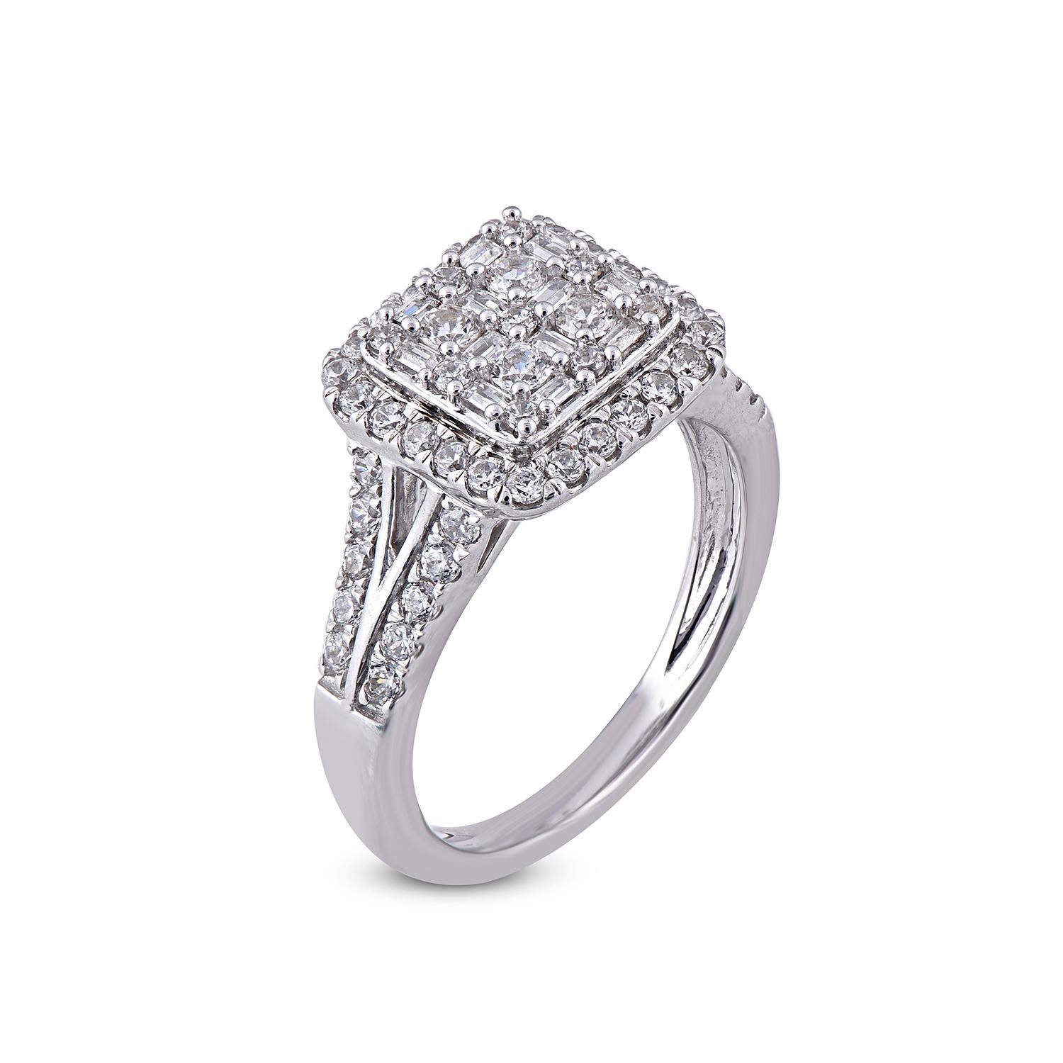 A beautifully designed engagement halo ring studded with 57 round diamonds and 12 baguette cut diamond in prong, setting. The ring is crafted in 14 Karat white gold. The ring is available in multiple sizes. Diamonds are graded H-I color I2 Clarity.