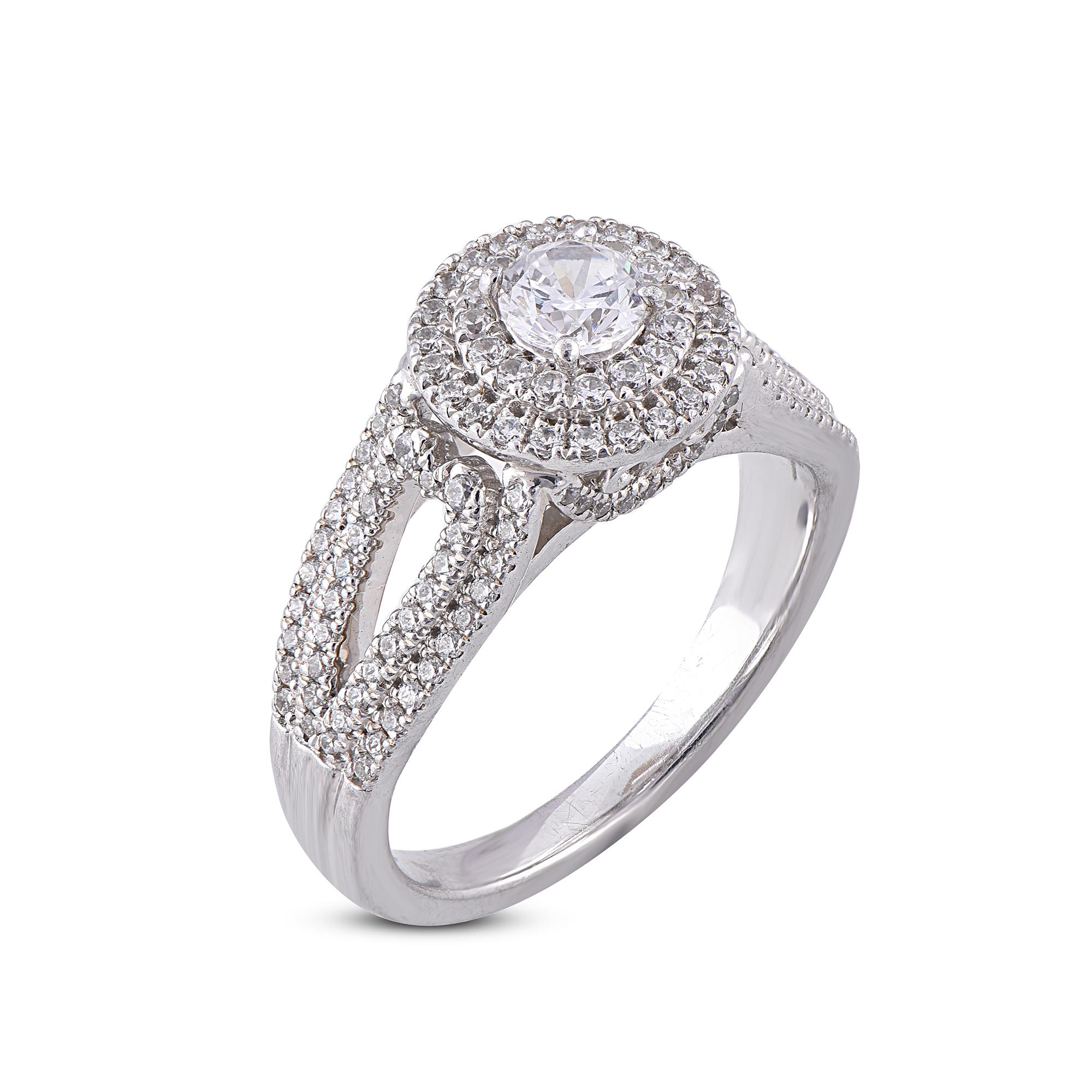 Stunning and classic, this diamond ring is beautifully crafted in 18 Karat White Gold and 1.00ct total diamond weight. The engagement ring is lined with rows of sparkling 143 round diamonds in secured prong and pave settings. the diamonds are