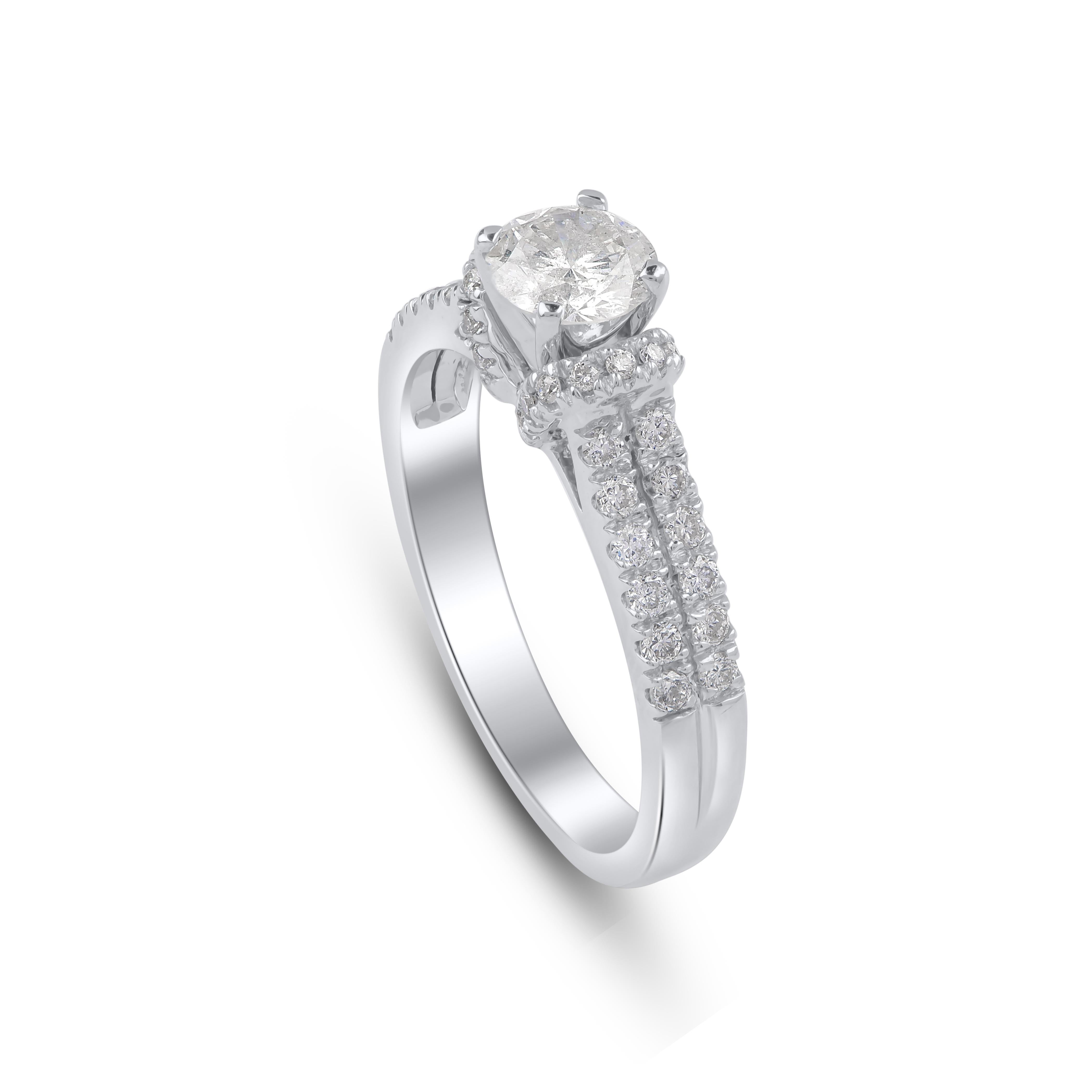 This engagement ring features 43 round and diamonds set in prong setting and fashioned in 18 kt white gold. Diamonds are graded J-K Color, I3 Clarity. Ring size is US size 7 and can be resized on request.
