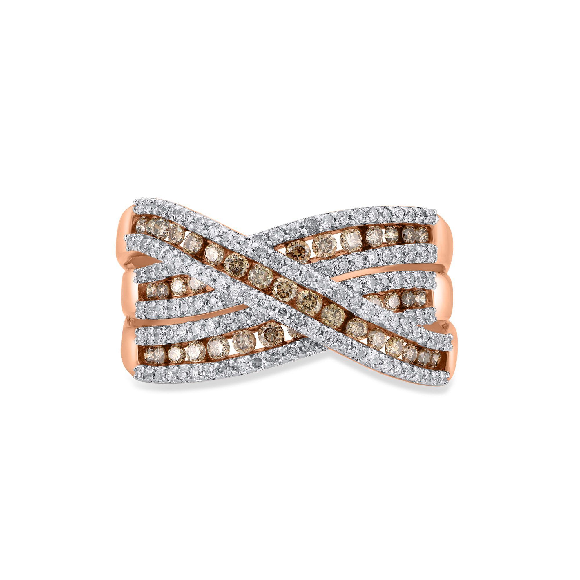 This comfort fit Criss-cross Cocktail diamond ring is crafted in 10 kt rose gold. Dazzles with 187 round-cut diamonds embedded beautifully in prong and channel setting. White diamonds are graded H-I Color, I3 Clarity and Champagne diamonds I1-I3