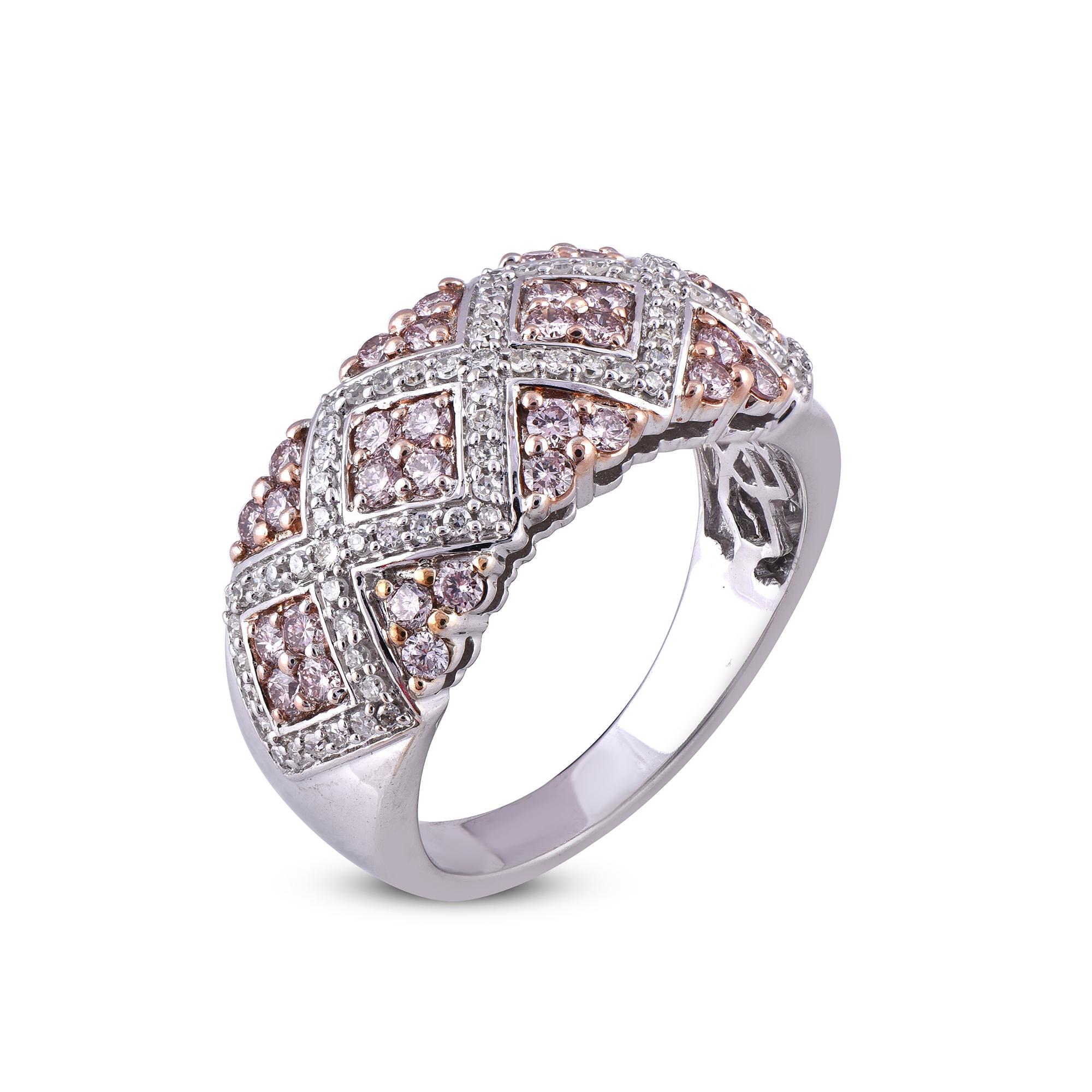 Beautifully crafted in 18K white gold crossover wedding band ring featuring wave design and jeweled with white and pink diamonds. This ring is superbly detailed to perfection and set with 1.00 carat of sparkling 77 round and 34 pink diamonds in