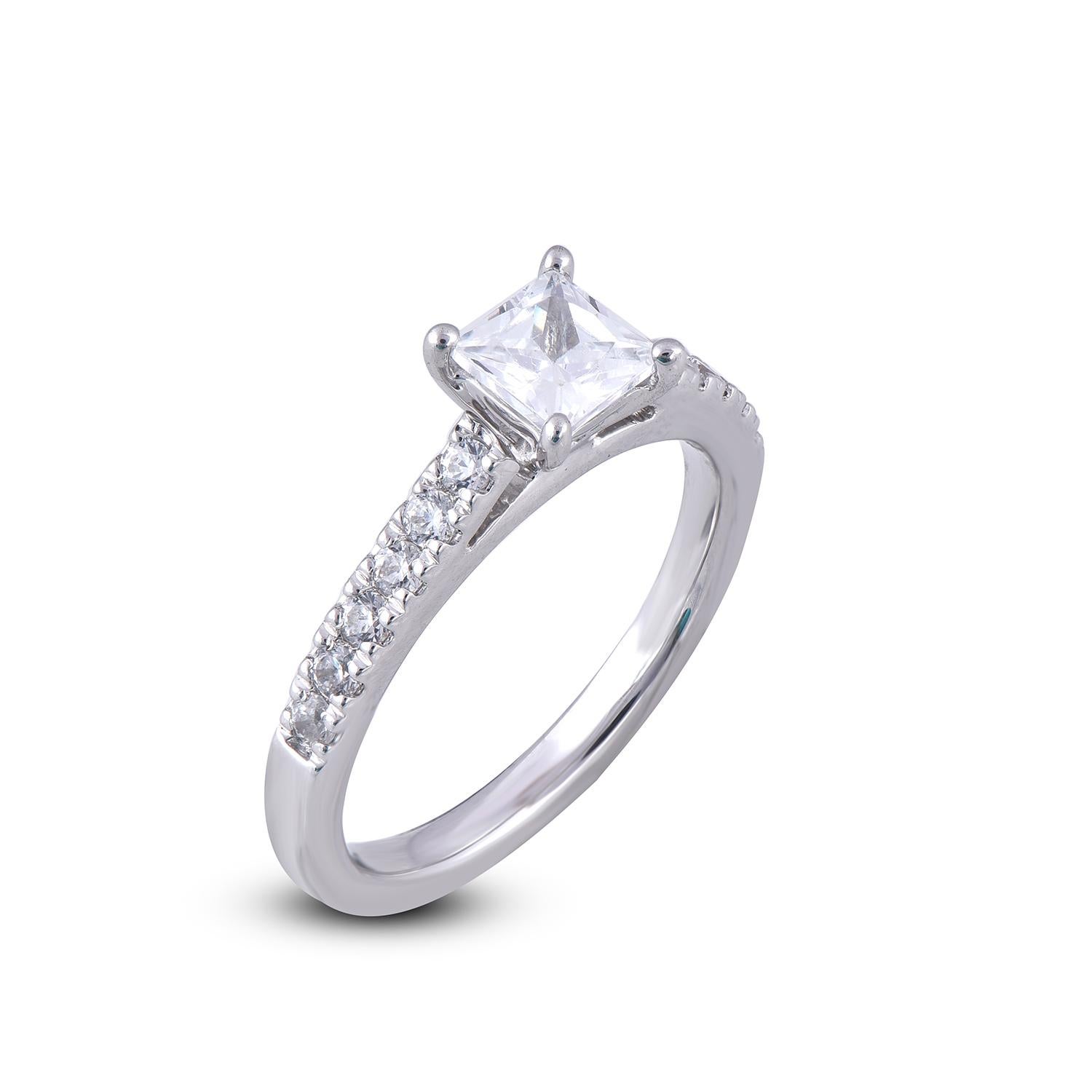 This diamond engagement ring is expertly crafted in 18 Karat White Gold and features 0.75 ct centre Princess Diamond and 0.25 ct of diamond on shank lined diamonds set in prong setting. The diamond are natural, not treated and dazzles in G-H color