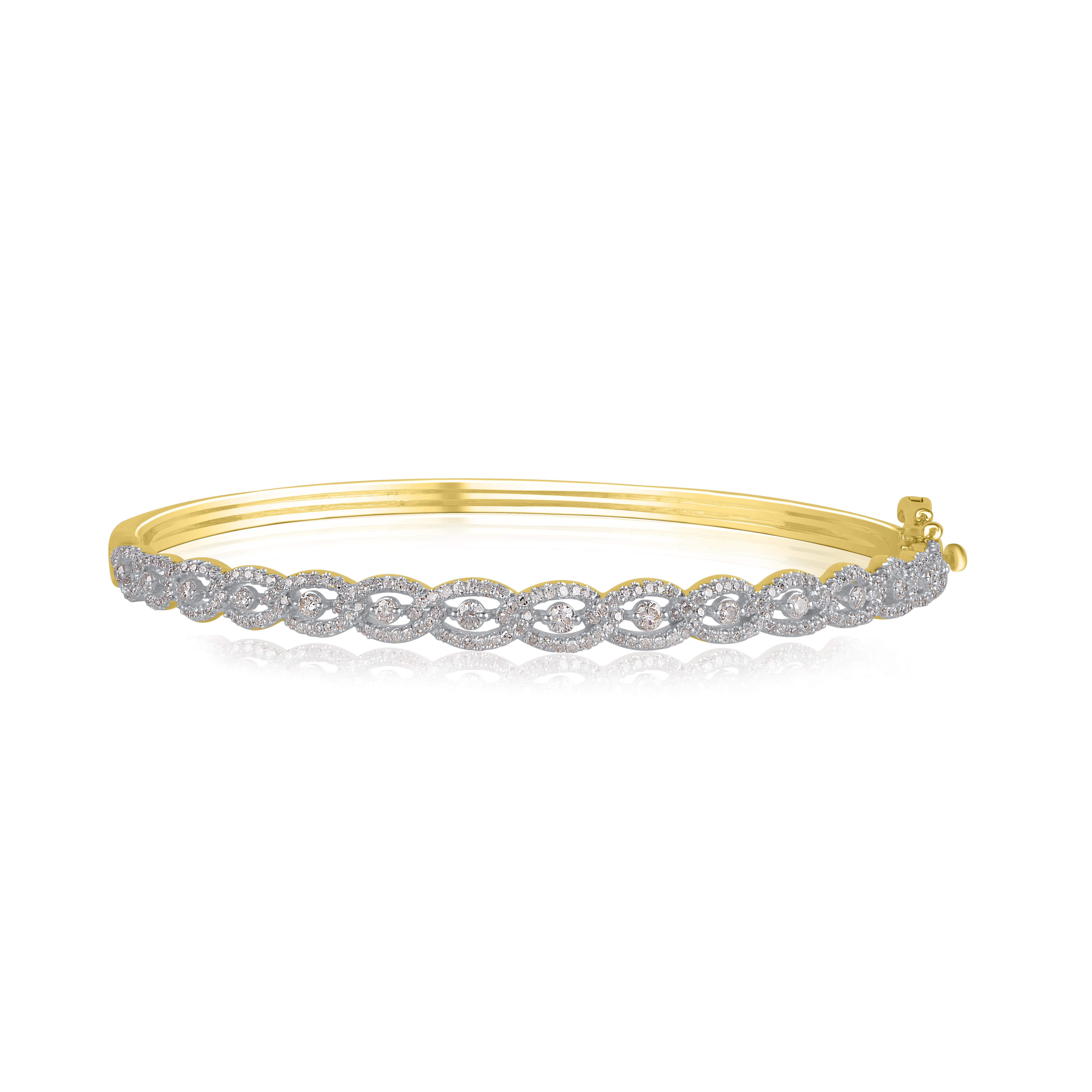 A classic look just for her, this diamond tennis bangle is certain to take her breath away. Dazzles with 253 round diamond set beautifully in prong setting and crafted by our experts in 14 karat yellow gold. The total weight of diamond is 1.00 Carat