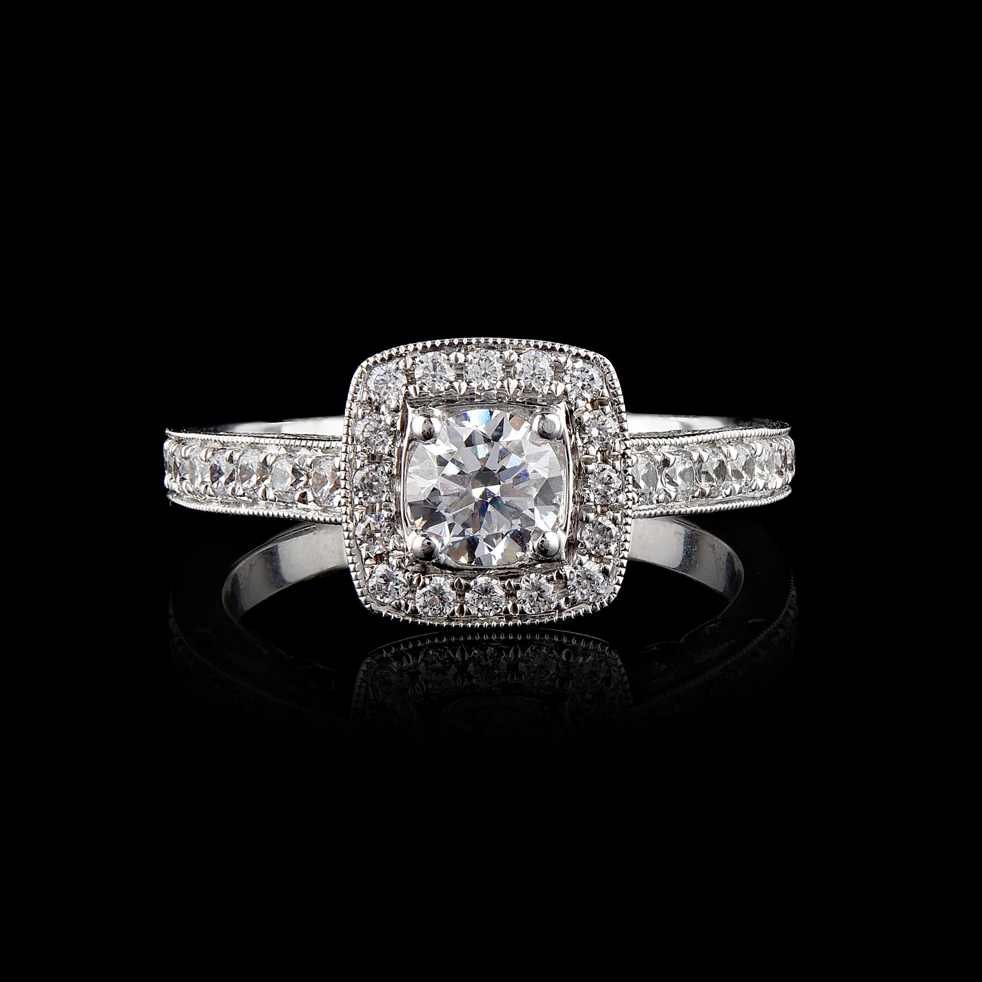 This diamond frame Wide Band Ring is expertly crafted in 18 Karat White Gold and features 0.45 ct centre stone and 0.55 ct diamond frame and shoulders set in flush, prong and micro prong setting. The diamond are natural, not treated and shines