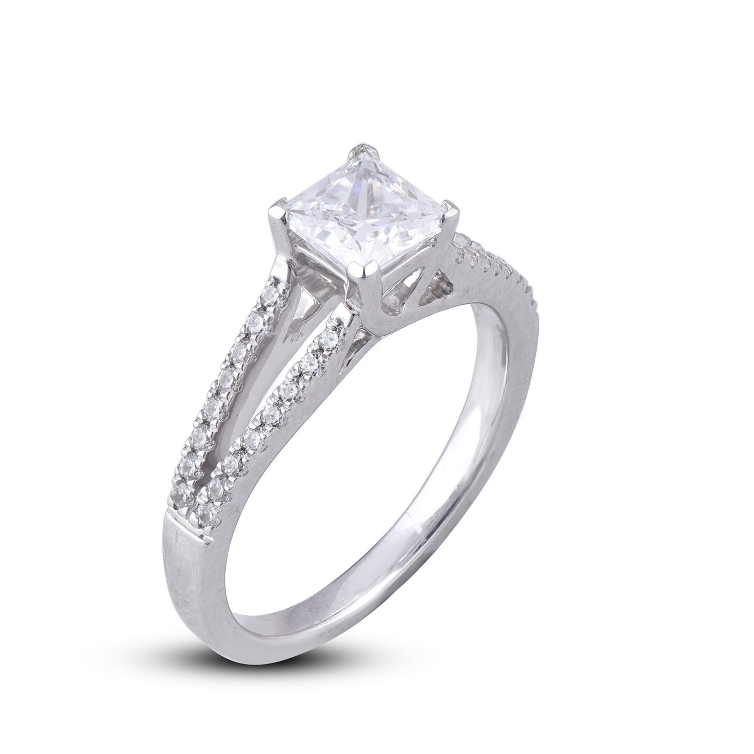 Simply stunning engagement ring features 0.75 ct centre stone and 0.25 ct diamond frame and split shank lined diamonds. This ring is handcrafted in 18 kt white gold and embellished with 79 brilliant round diamond set in prong and micro-pave setting.
