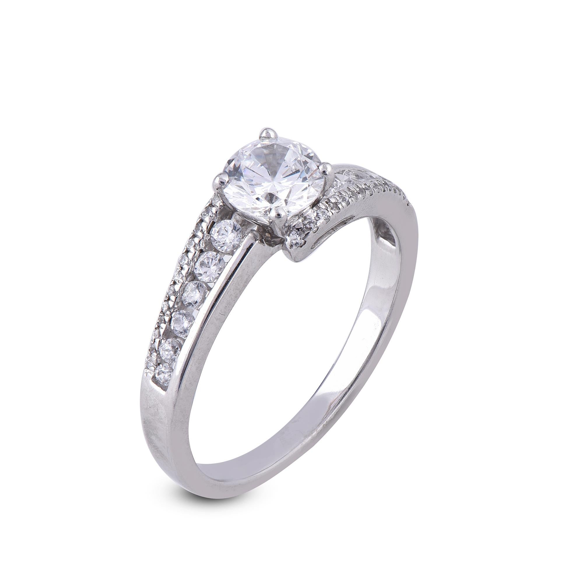 This engagement ring features 0.70 ct of centre stone and 0.30 ct of lined diamonds. Expertly Crafted of sparkling 18 karat white gold in high polish finish and set with 43 sparkling round and cut diamonds set in channel and prong setting, G-H Color